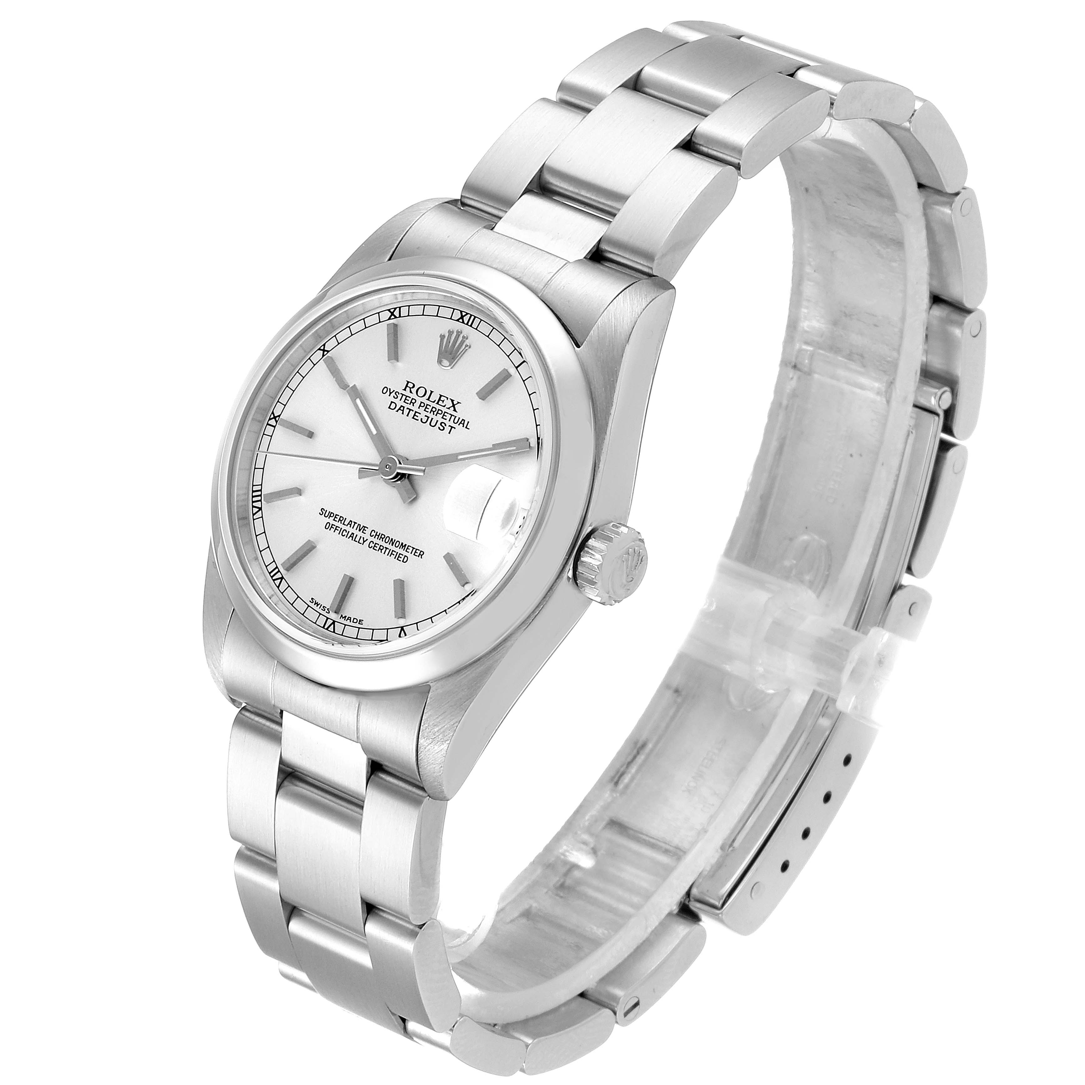 The watch, a Rolex Mid-Size 78240 Women
s Stainless Steel Silver Dial 78240 Women
s Stainless Steel Silver Dial model, is shown at a three-quarter angle, highlighting the face, bracelet, and crown.