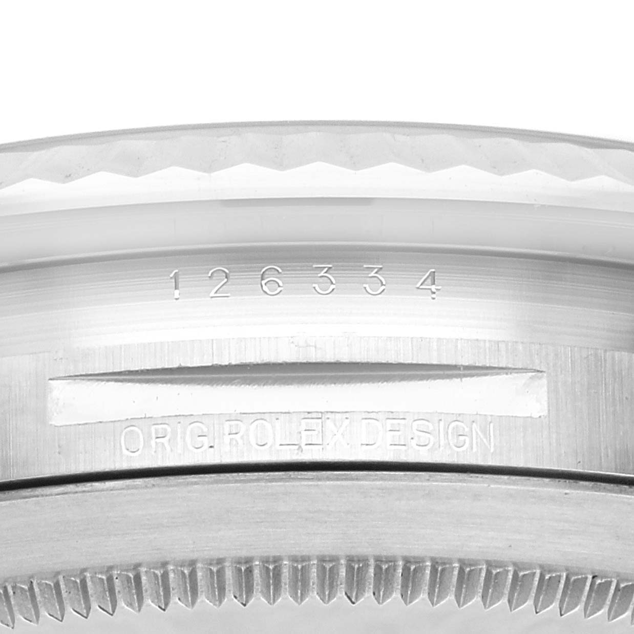 The image shows a close-up of the case back and serial number of the Rolex Datejust 41 126334 Men's Stainless Steel Green Dial 126334 Men's Stainless Steel Green Dial model, displaying "ORIG ROLEX DESIGN" engraving.