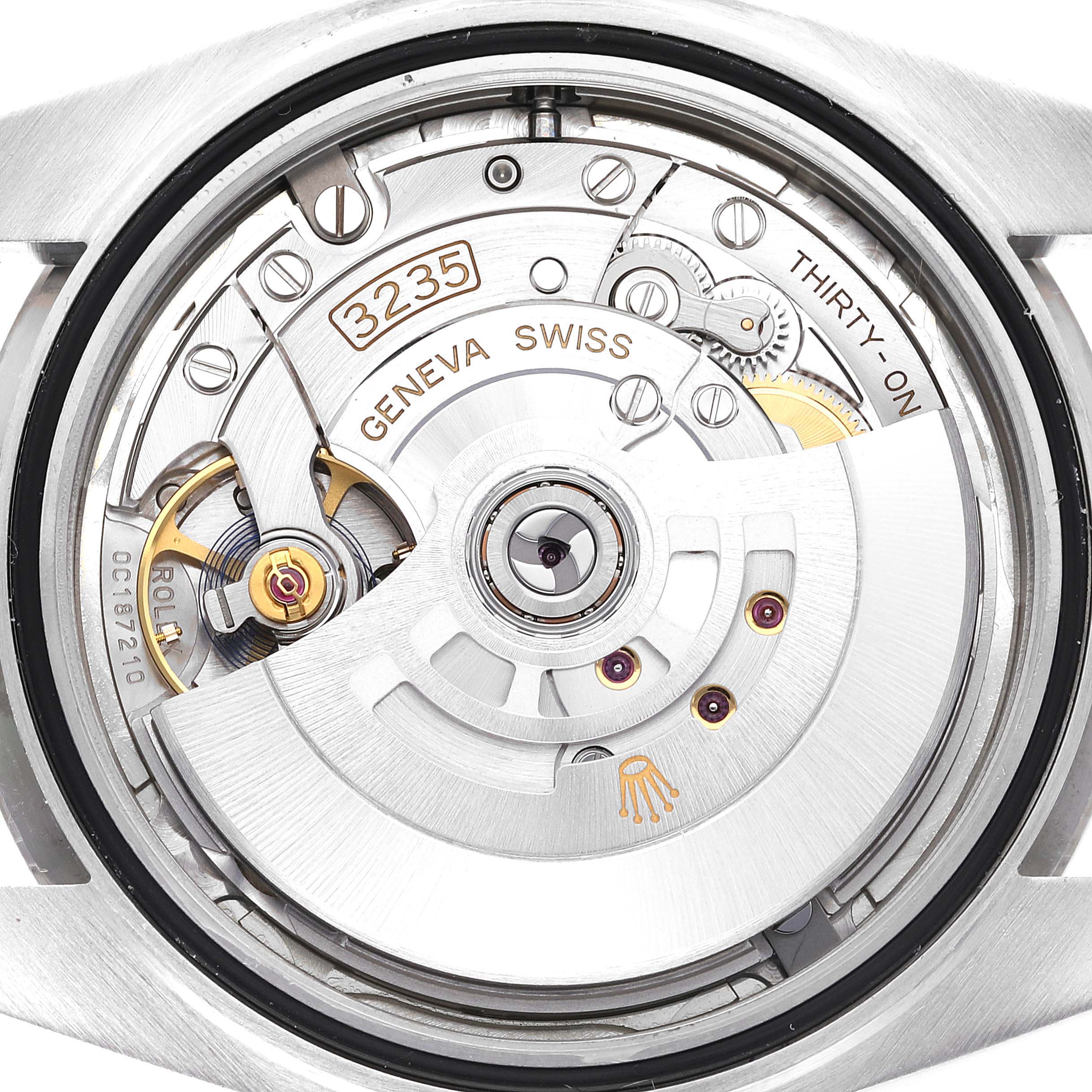 The image shows the movement of a Rolex Datejust 41 126334 Men
s Stainless Steel Silver Dial 126334 Men
s Stainless Steel Silver Dial from the back, highlighting its intricate internal mechanics.