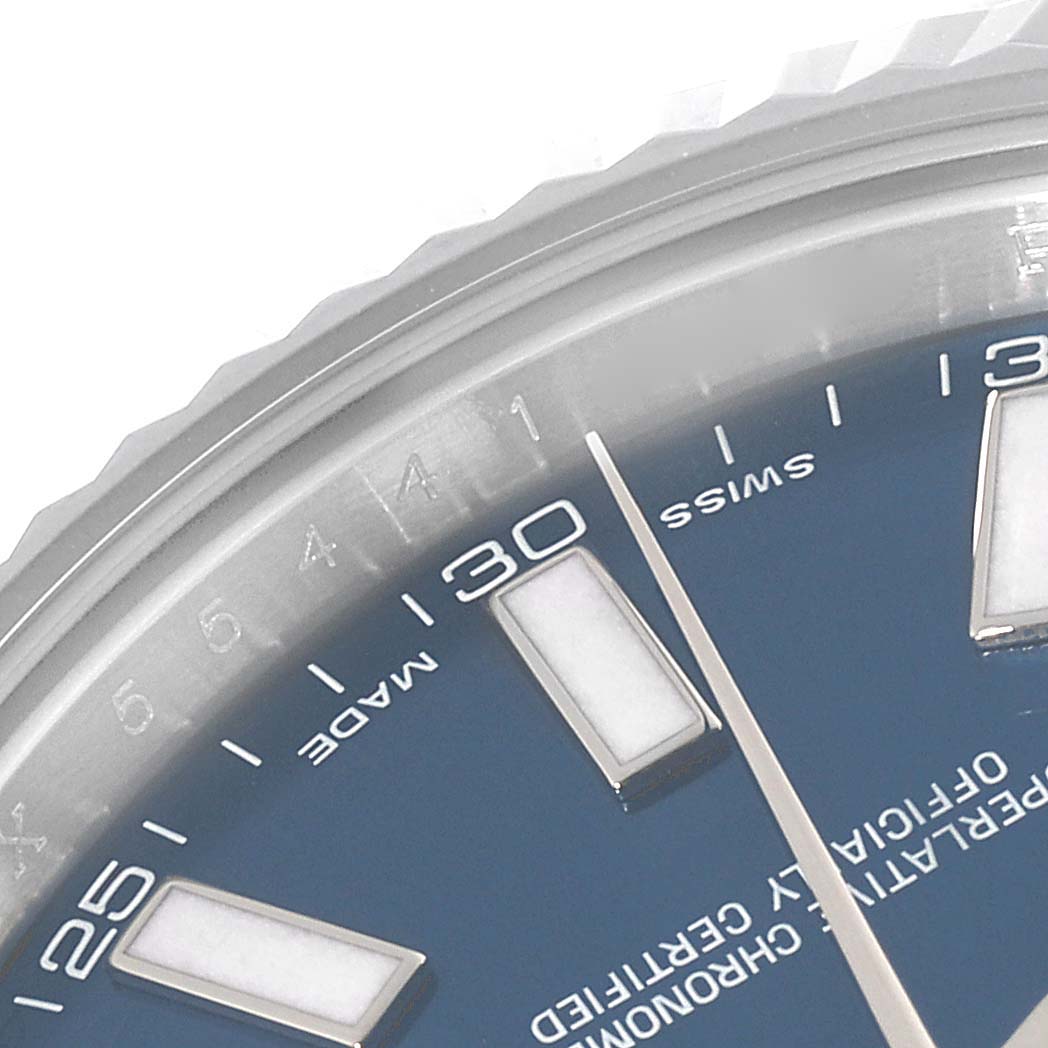 The image shows a close-up of the dial and edge of the bezel of a Rolex Datejust 41 116334 Men
s Stainless Steel Blue Dial 116334 Men
s Stainless Steel Blue Dial watch.