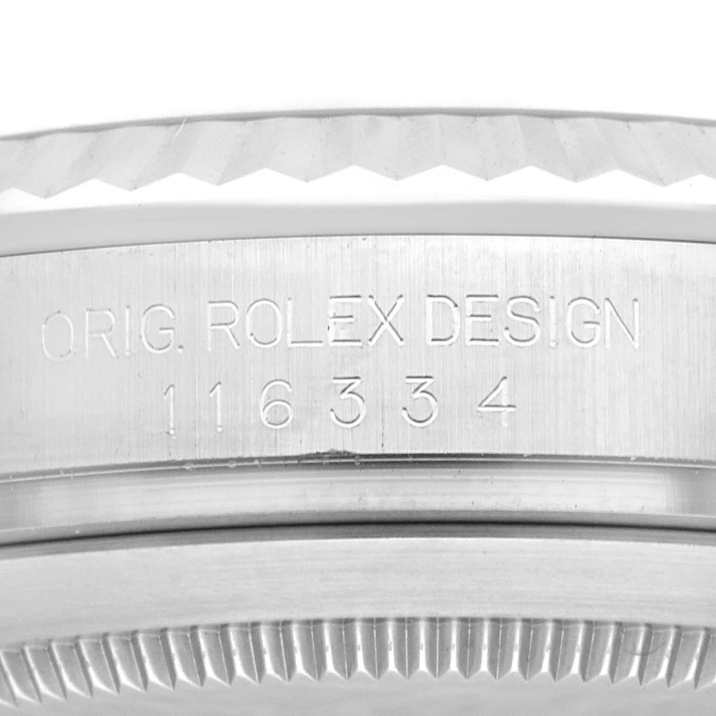 The image shows a close-up of the side engraving on a Rolex Datejust 41 116334 Men
s Stainless Steel Blue Dial 116334 Men
s Stainless Steel Blue Dial model, highlighting its serial number and design label.