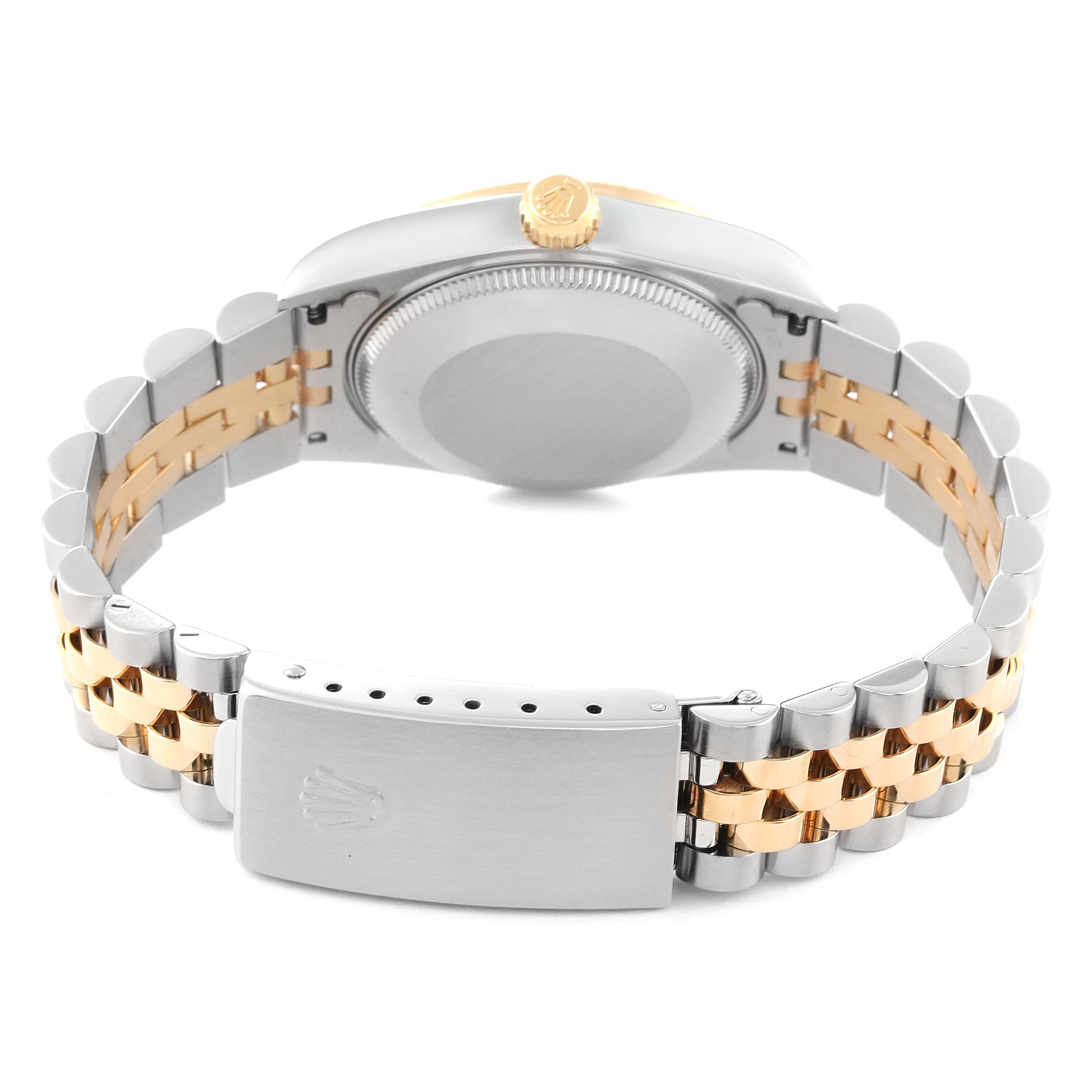 The image shows the back view of a Rolex Mid-Size 68273 Women
s Steel and Gold (two tone) Champagne Dial 68273 Women
s Steel and Gold (two tone) Champagne Dial model watch, highlighting the case back, crown, and bi-tone bracelet clasp.