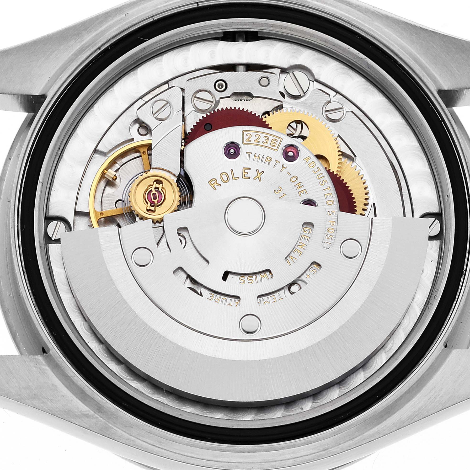 The image shows the exposed movement of a Rolex Mid-Size 278344 Women's Stainless Steel Purple Dial 278344 Women's Stainless Steel Purple Dial watch from the back angle, revealing gears and the rotor.