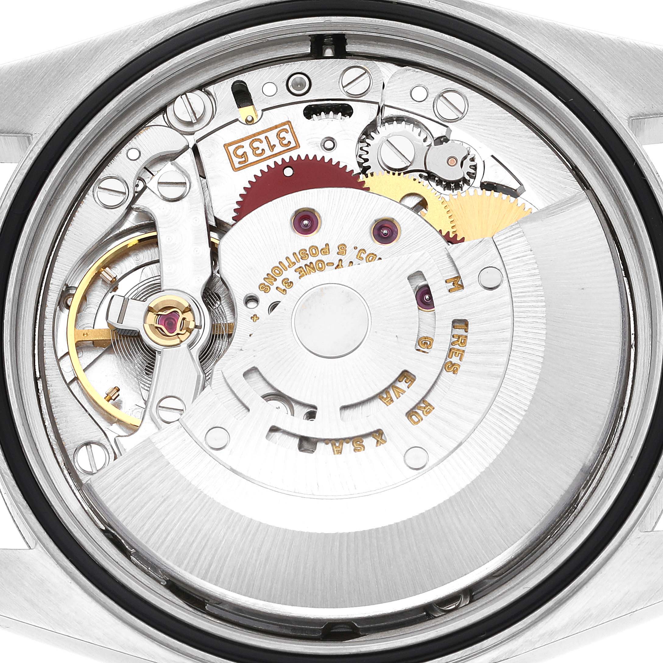 The image shows the open case back of a Rolex Datejust 16234 Men's Stainless Steel Pink Dial 16234 Men's Stainless Steel Pink Dial model, revealing its intricate movement components.