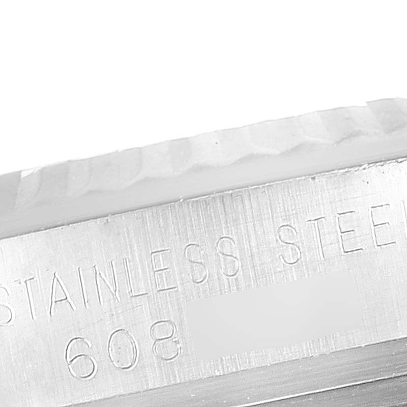 This close-up shows the side engraving on the stainless steel case of a Vintage Collection model by Rolex.