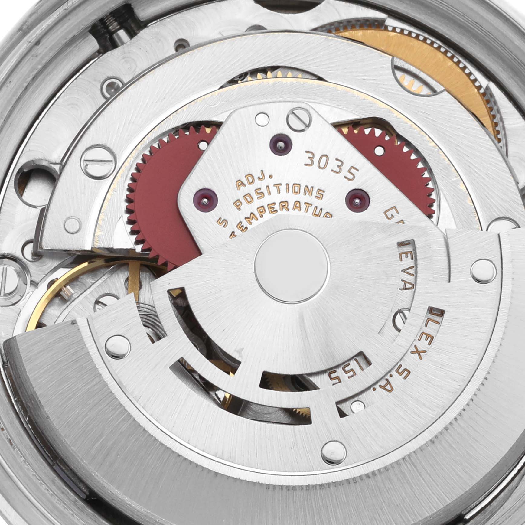 The image shows a close-up of the Rolex Datejust 16014 Men's Stainless Steel Silver Dial 16014 Men's Stainless Steel Silver Dial movement, highlighting gears and the rotor.