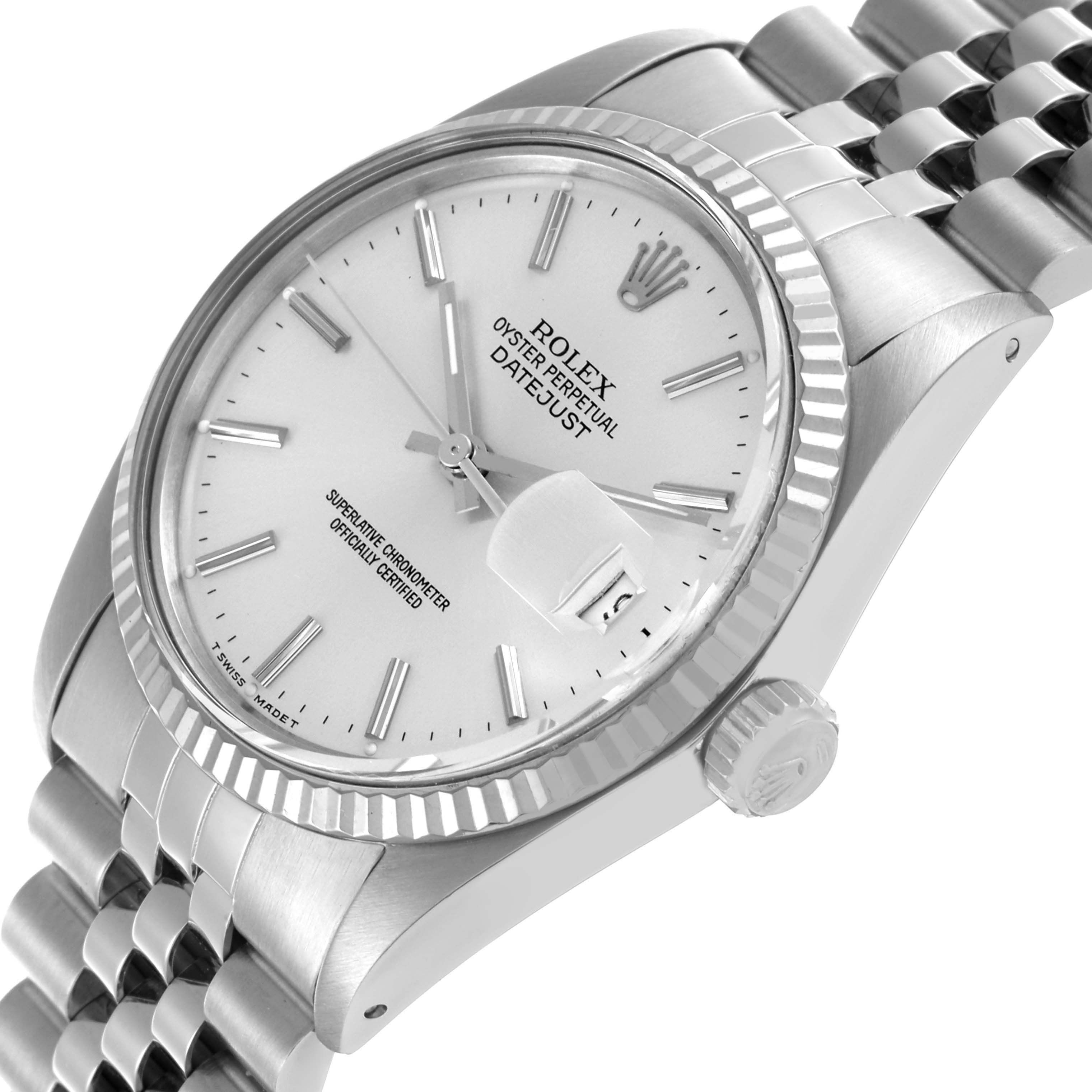 The Rolex Datejust 16014 Men's Stainless Steel Silver Dial 16014 Men's Stainless Steel Silver Dial watch is shown at an angled side view, highlighting the case, dial, crown, and Jubilee bracelet.