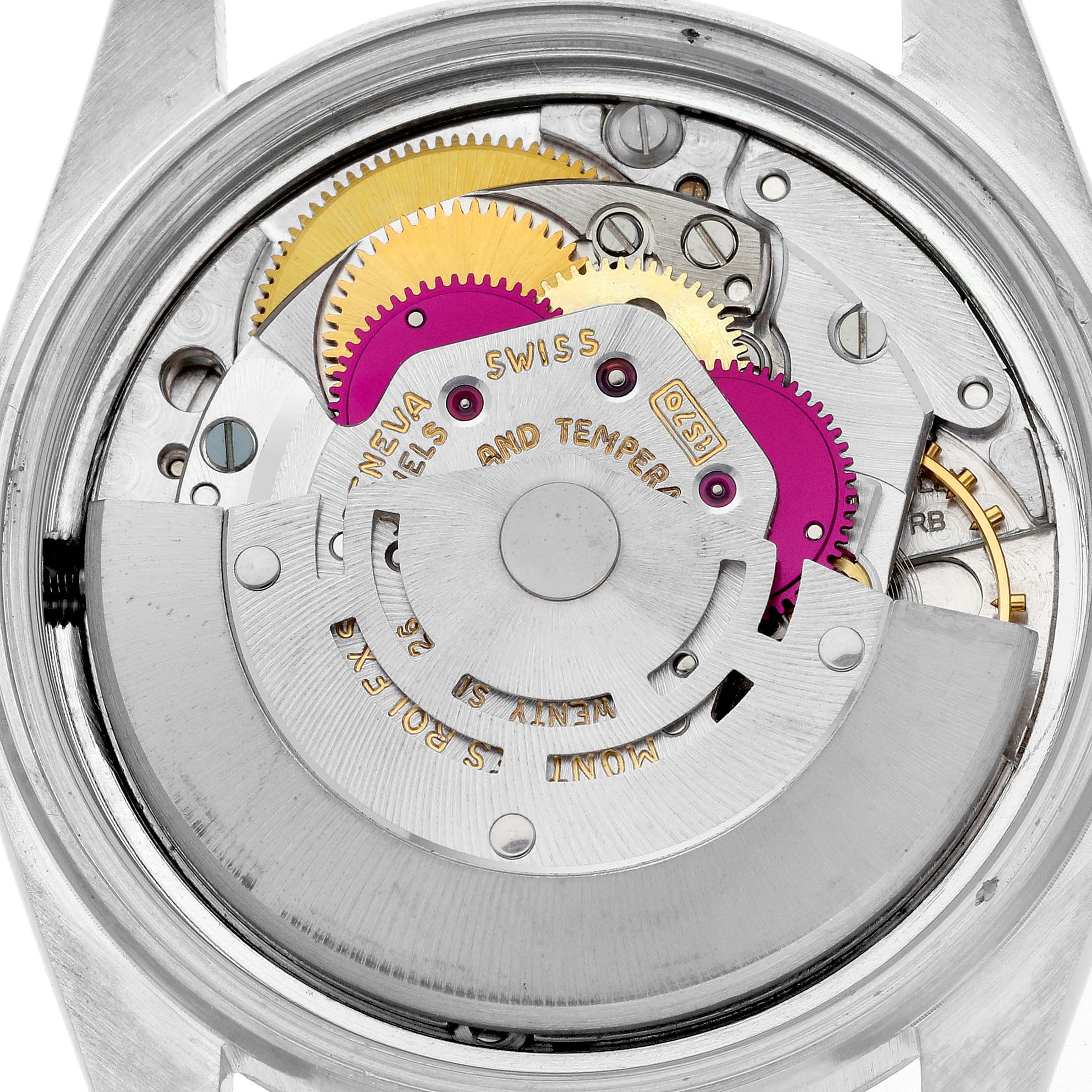 This image shows the movement mechanism of a Rolex Datejust 1601 Men's Stainless Steel Silver Dial 1601 Men's Stainless Steel Silver Dial watch from the back, highlighting gears and components.