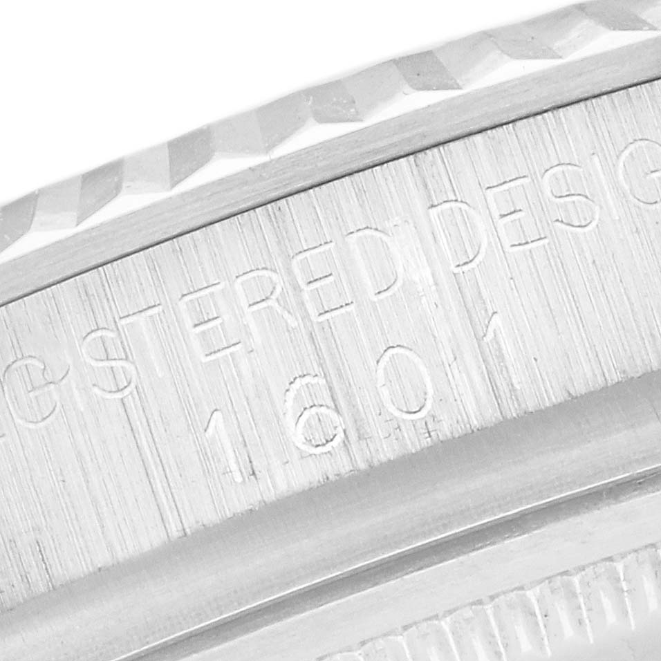 This image shows a close-up of the case side with "1601" engraving on the Rolex Datejust 1601 Men's Stainless Steel Silver Dial 1601 Men's Stainless Steel Silver Dial watch.