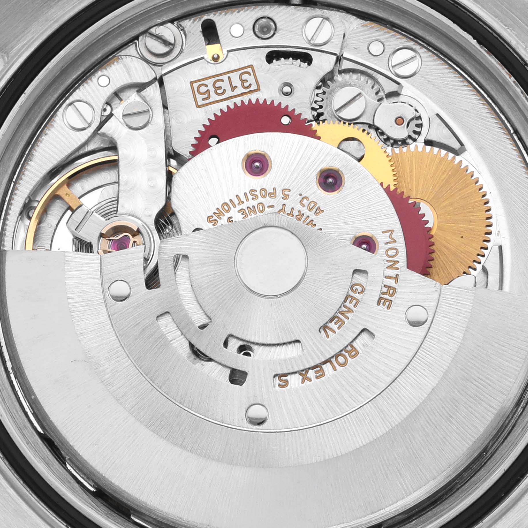 The image shows the internal mechanism of a Rolex Datejust 16233 Men
s Stainless Steel White Dial 16233 Men
s Stainless Steel White Dial watch, displaying gears and movement parts from a top-down angle.