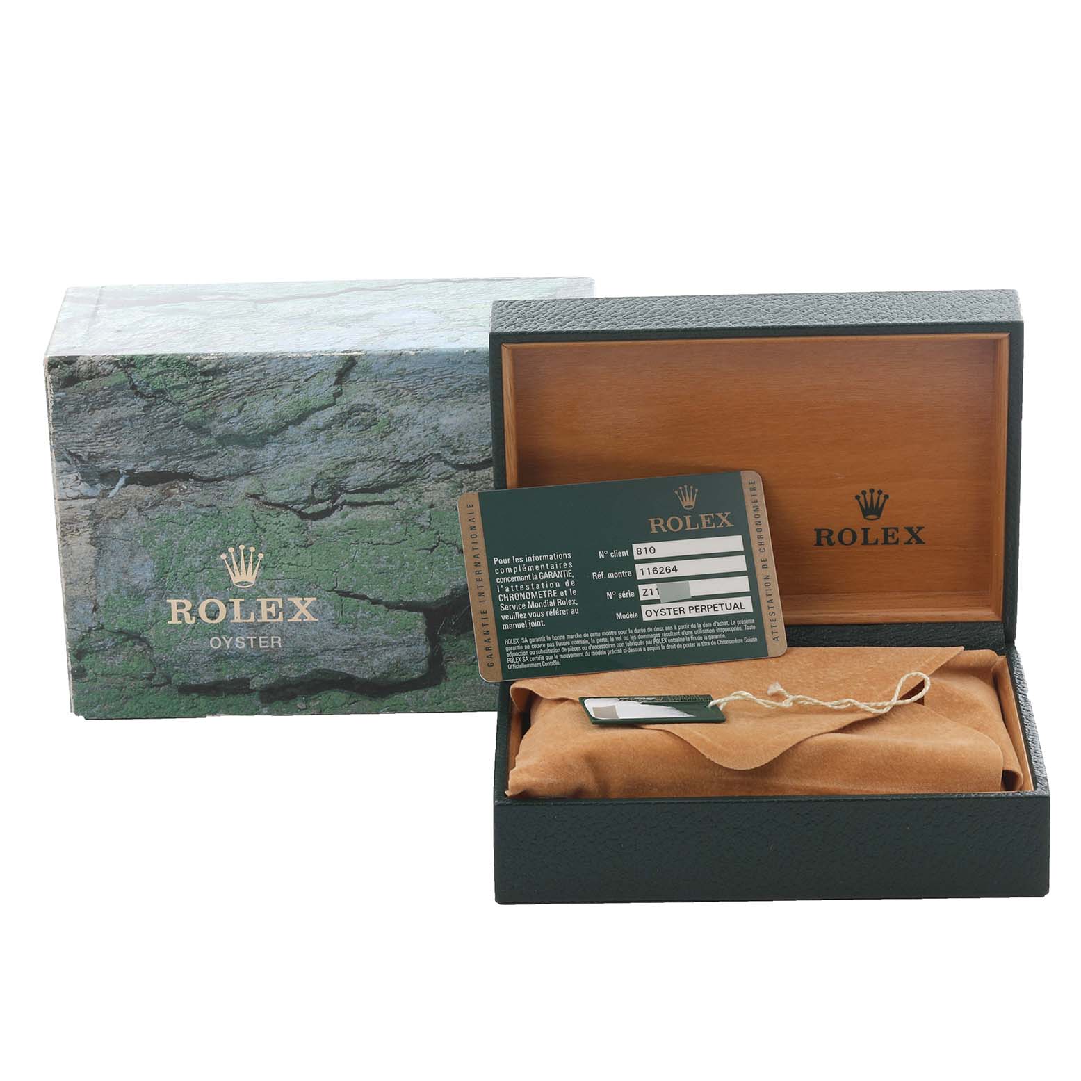 The image shows packaging for a Rolex Turn-o-Graph 116264 Men's Stainless Steel Blue Dial 116264 Men's Stainless Steel Blue Dial watch, including an open box, a warranty card, and cushioning.