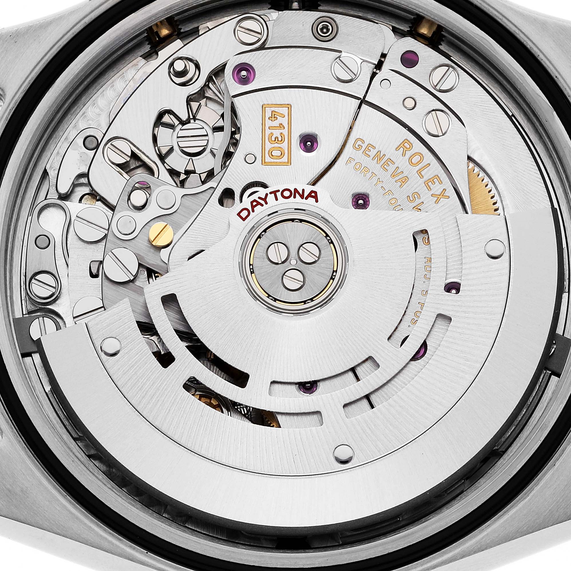 This image shows the intricate inner mechanics of a Rolex Daytona 116523 Men's Steel and Gold (two tone) Black Dial 116523 Men's Steel and Gold (two tone) Black Dial watch from a rear view angle.