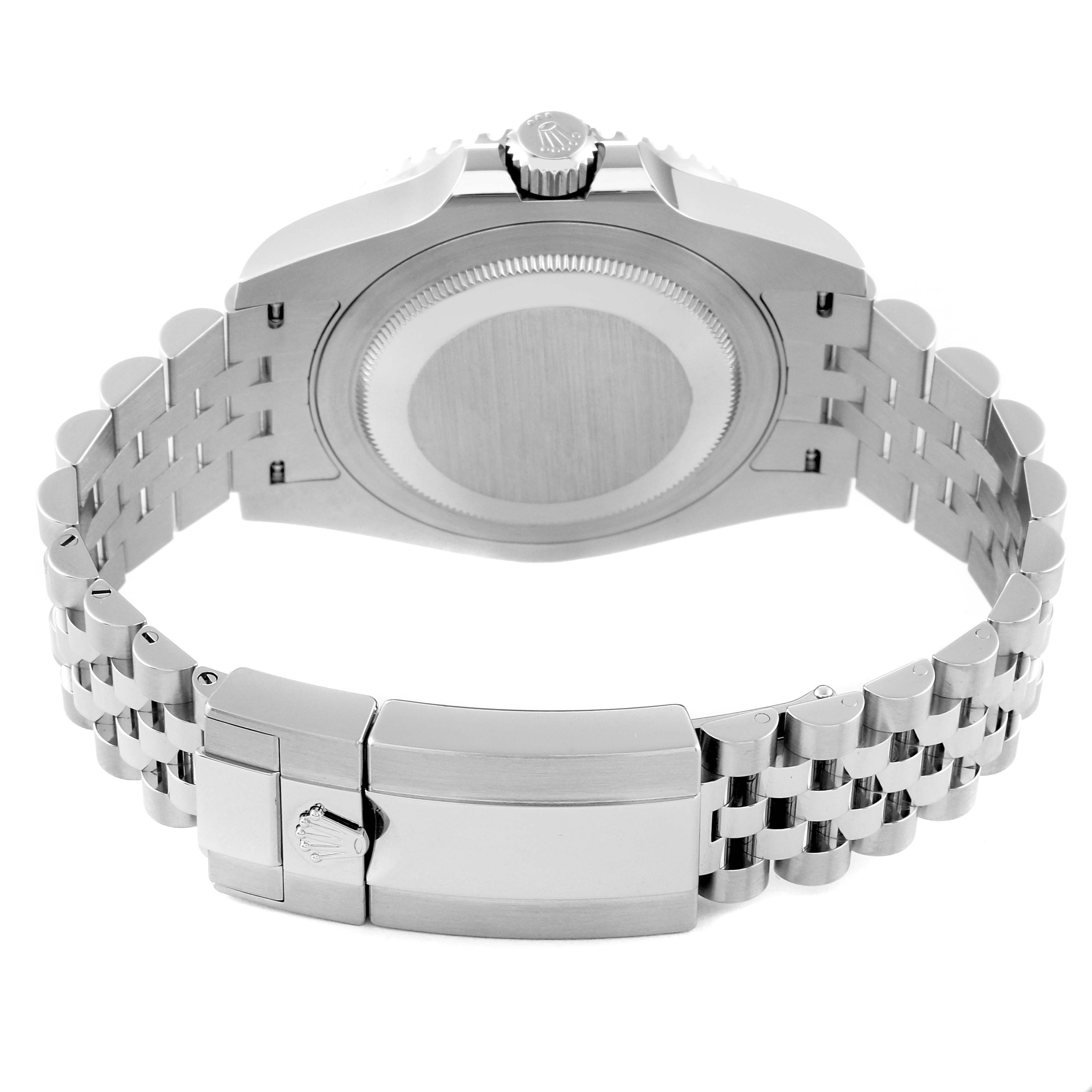 The image shows the rear case and bracelet clasp of a Rolex GMT-Master 126710BLNR Men
s Stainless Steel Black Dial 126710BLNR Men
s Stainless Steel Black Dial watch from a back angle.