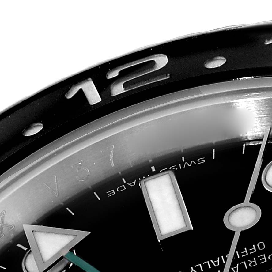 This close-up angle of the Rolex GMT-Master 116710LN Men
s Stainless Steel Black Dial 116710LN Men
s Stainless Steel Black Dial watch shows the bezel, part of the dial, and hour markers.