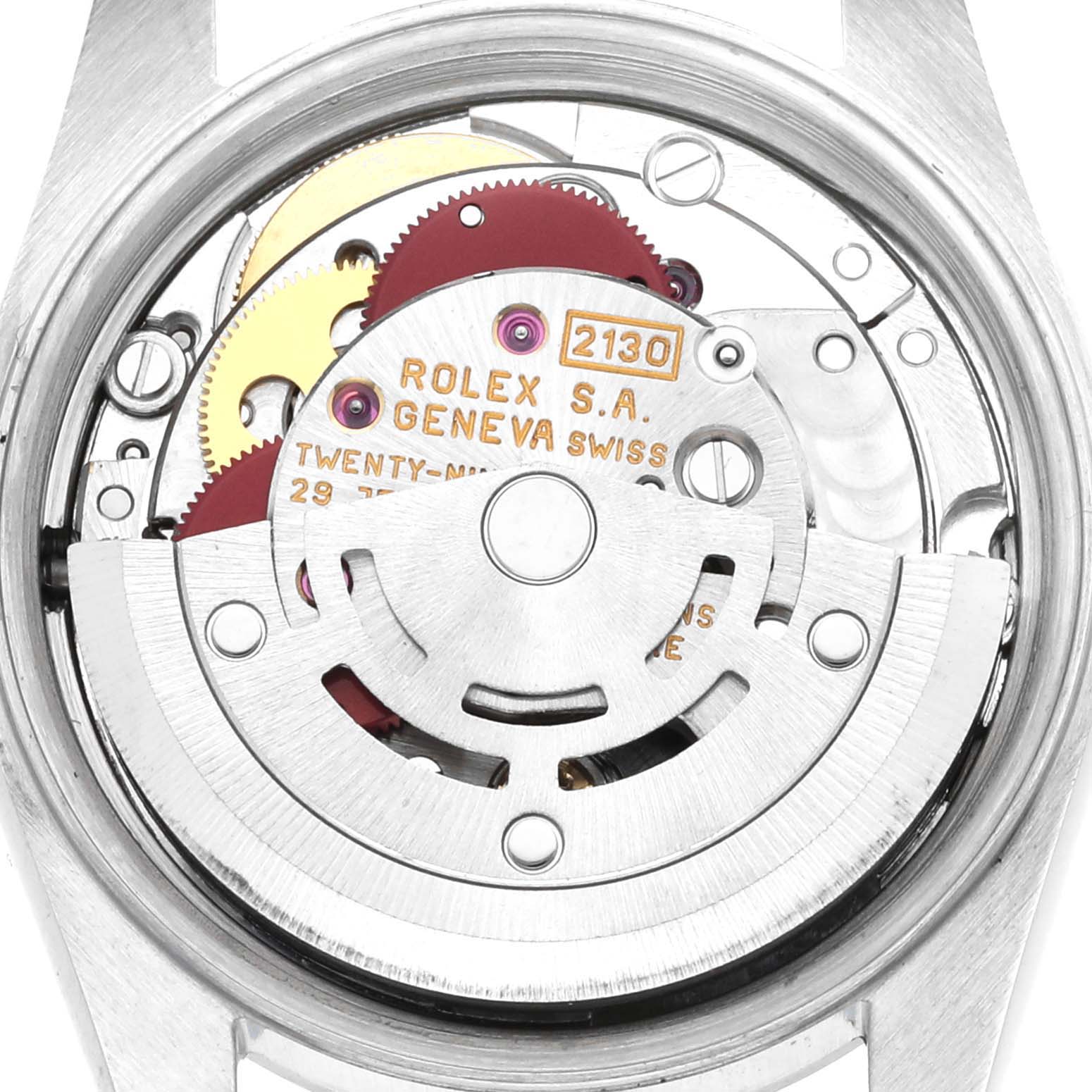 The image shows the movement of a Rolex Oyster Perpetual 67180 Women's Stainless Steel Black Dial 67180 Women's Stainless Steel Black Dial, highlighting its intricate internal mechanism from a rear angle.