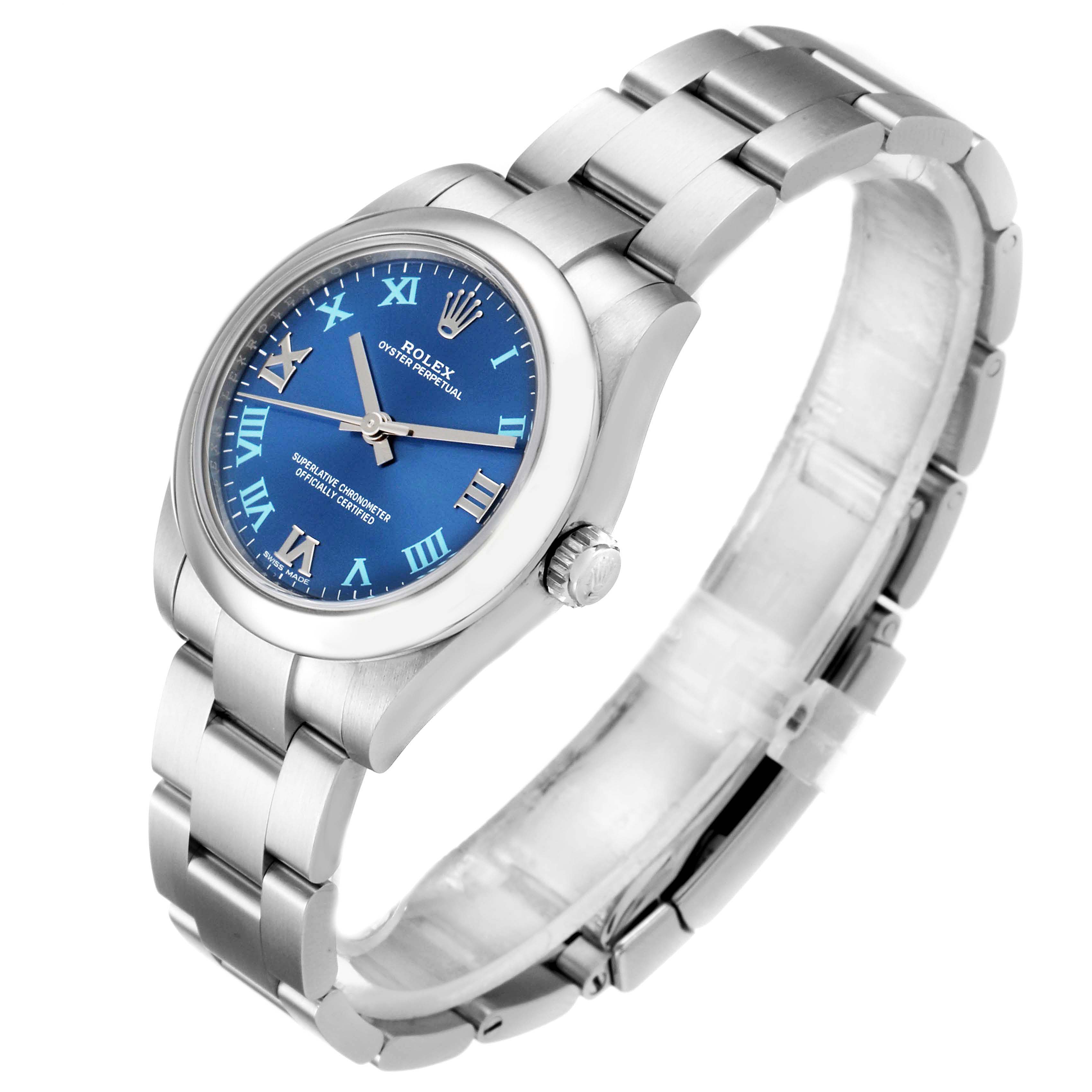 The Rolex Mid-Size 177200 Women
s Stainless Steel Blue Dial 177200 Women
s Stainless Steel Blue Dial watch is shown at a three-quarter angle, highlighting its blue dial, Roman numerals, and silver bracelet.