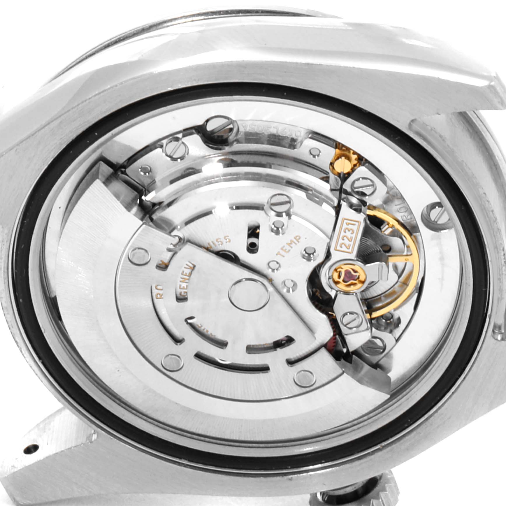 This image shows a close-up view of the movement mechanism of a Mid-Size Rolex watch.