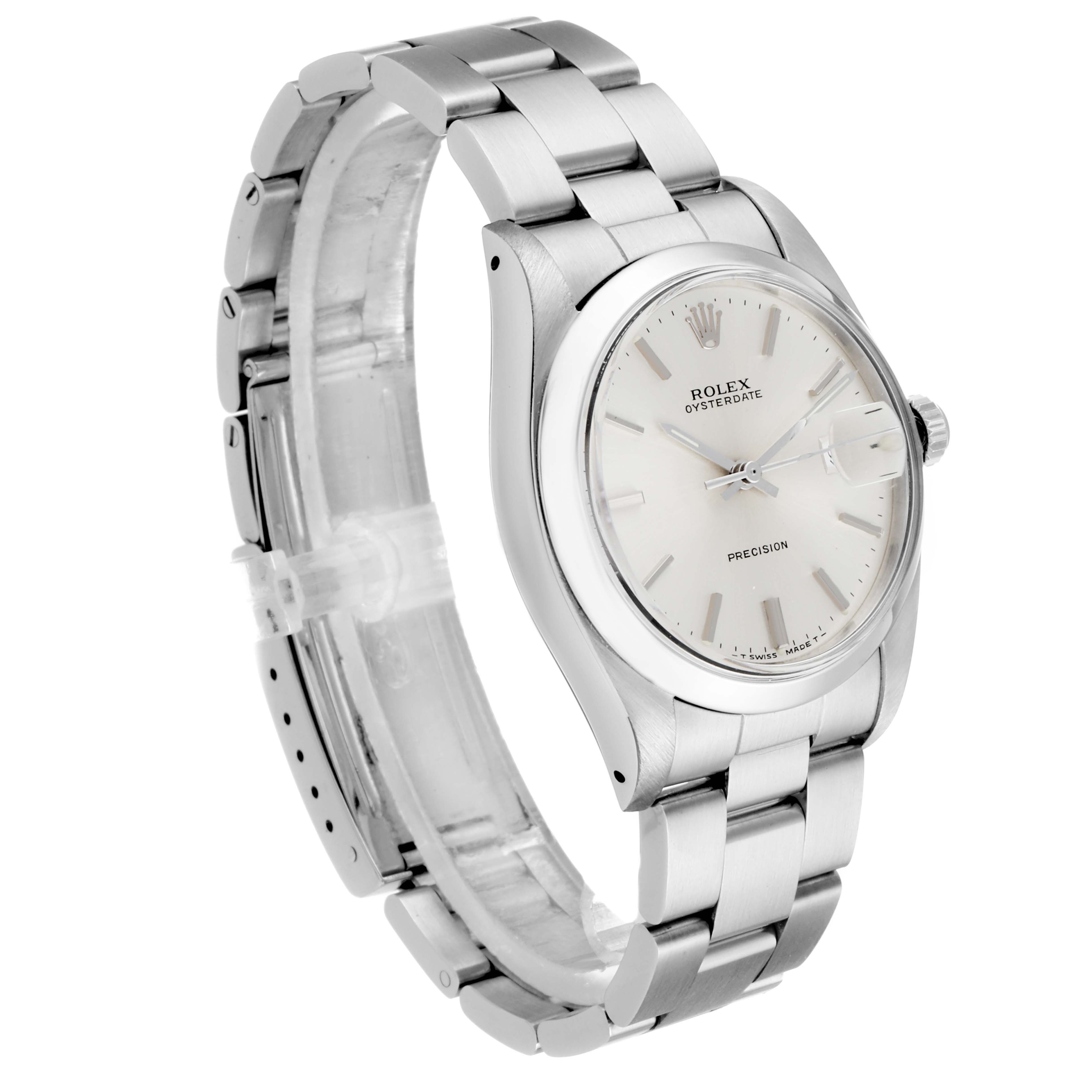 The image shows a side-angle view of a Rolex Vintage Collection 6694 Men's Stainless Steel Silver Dial 6694 Men's Stainless Steel Silver Dial watch, featuring its stainless steel bracelet and white dial.