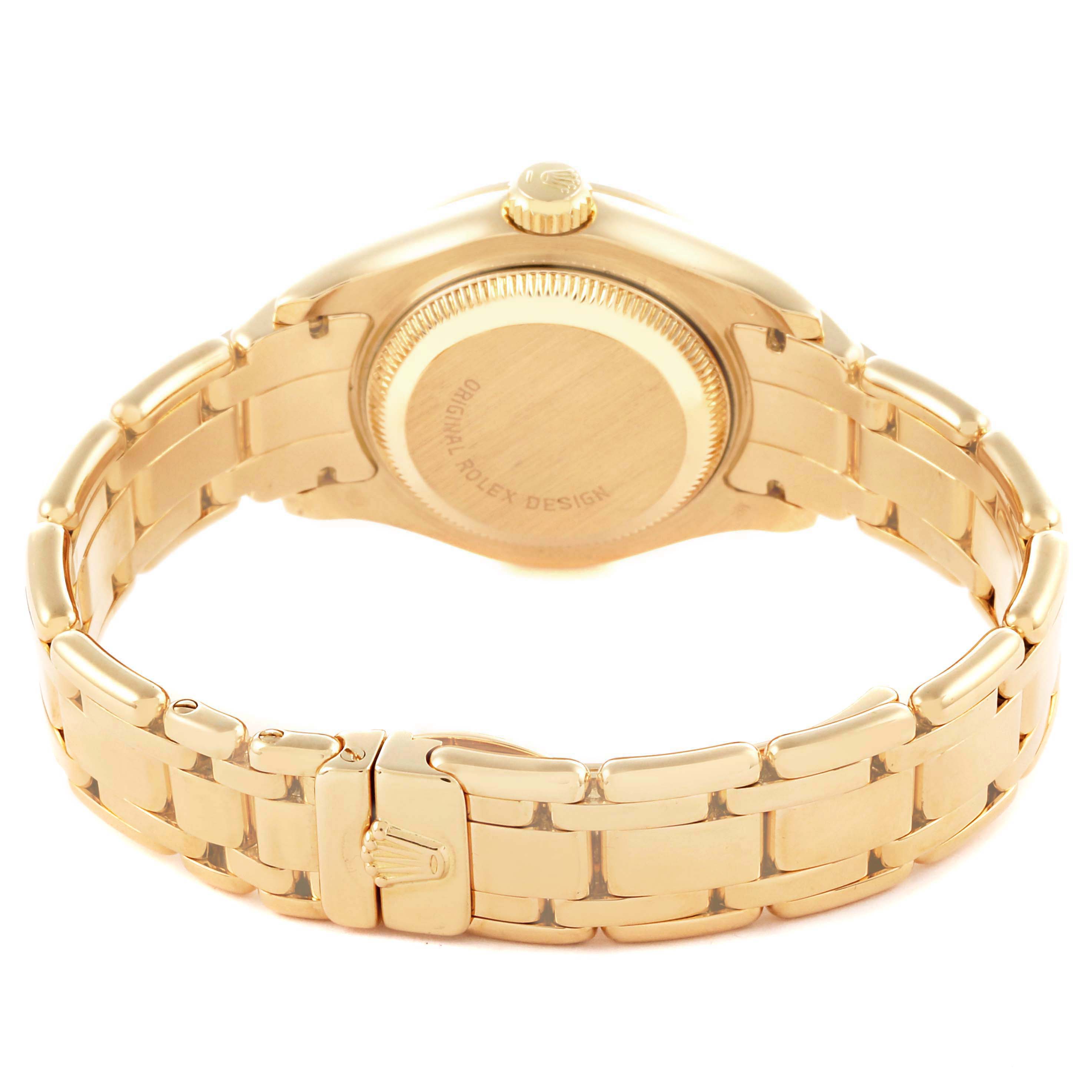 The image shows the back and bracelet of a Rolex Pearlmaster 69298 Women
s Yellow Gold Champagne Dial 69298 Women
s Yellow Gold Champagne Dial watch from a slightly elevated rear angle.