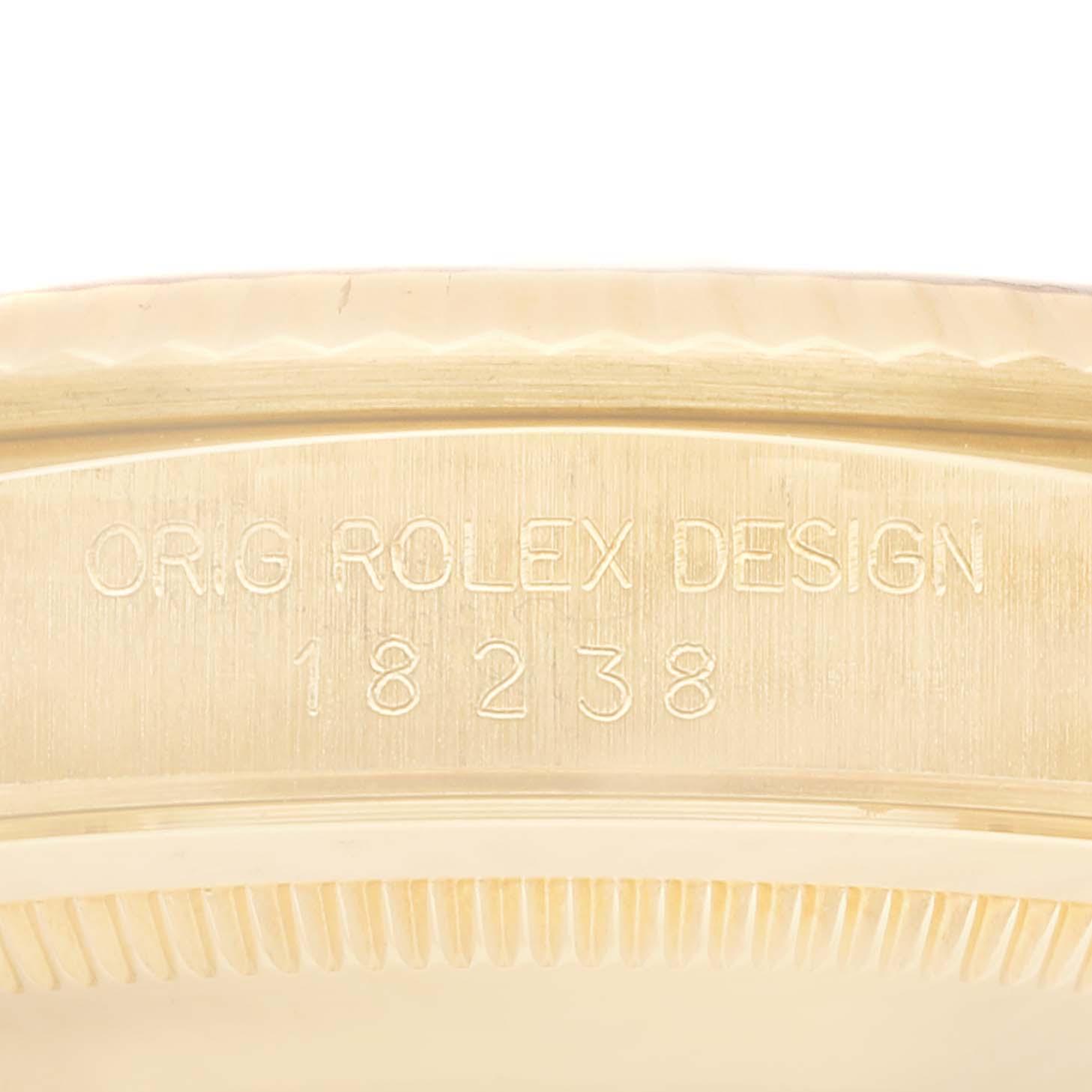 The image shows a close-up of the engraved side of the case from the President model by Rolex.