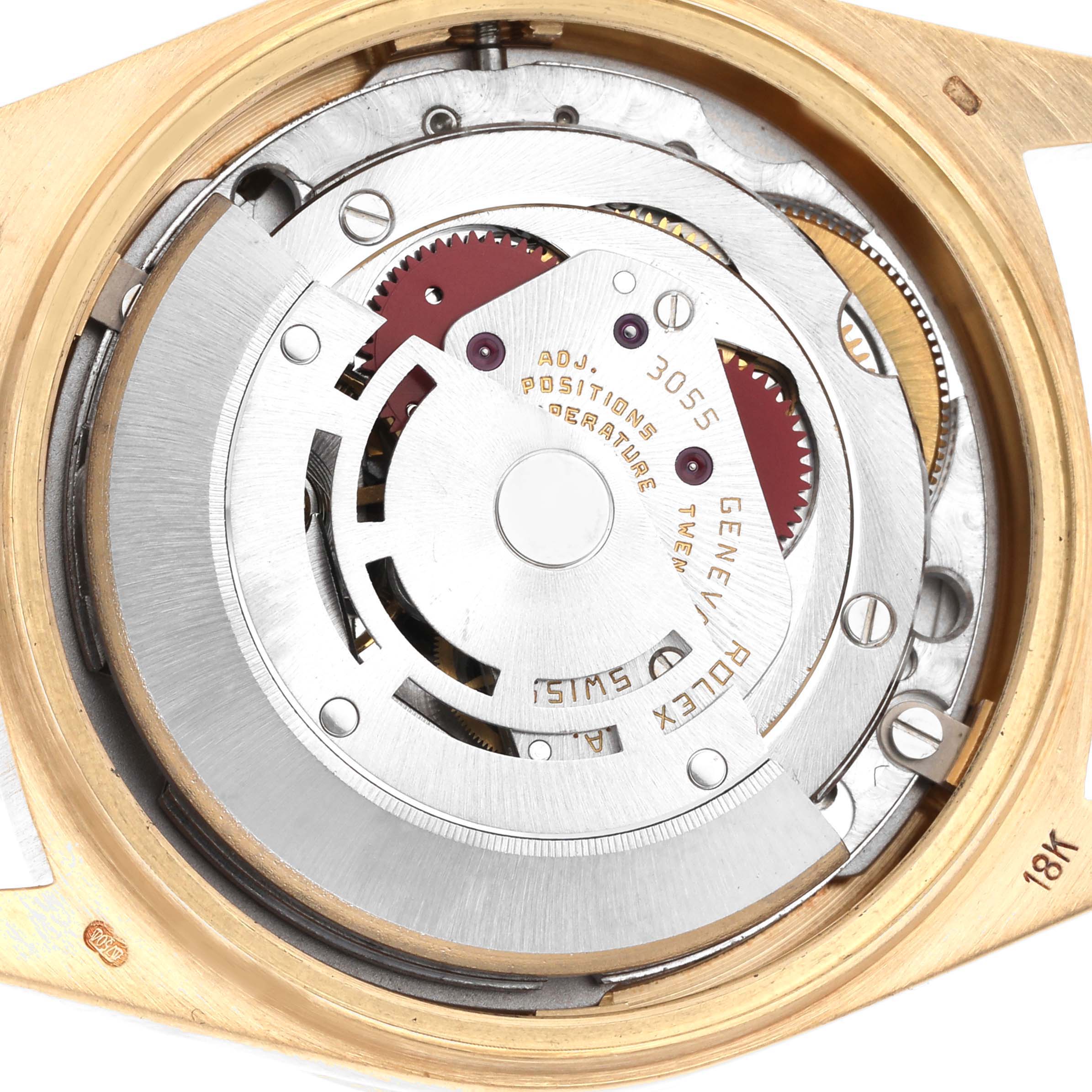 The image shows the movement inside a Rolex President 18048 Men
s Yellow Gold Champagne Dial 18048 Men
s Yellow Gold Champagne Dial model watch from a top-down angle, highlighting the rotor and gears.