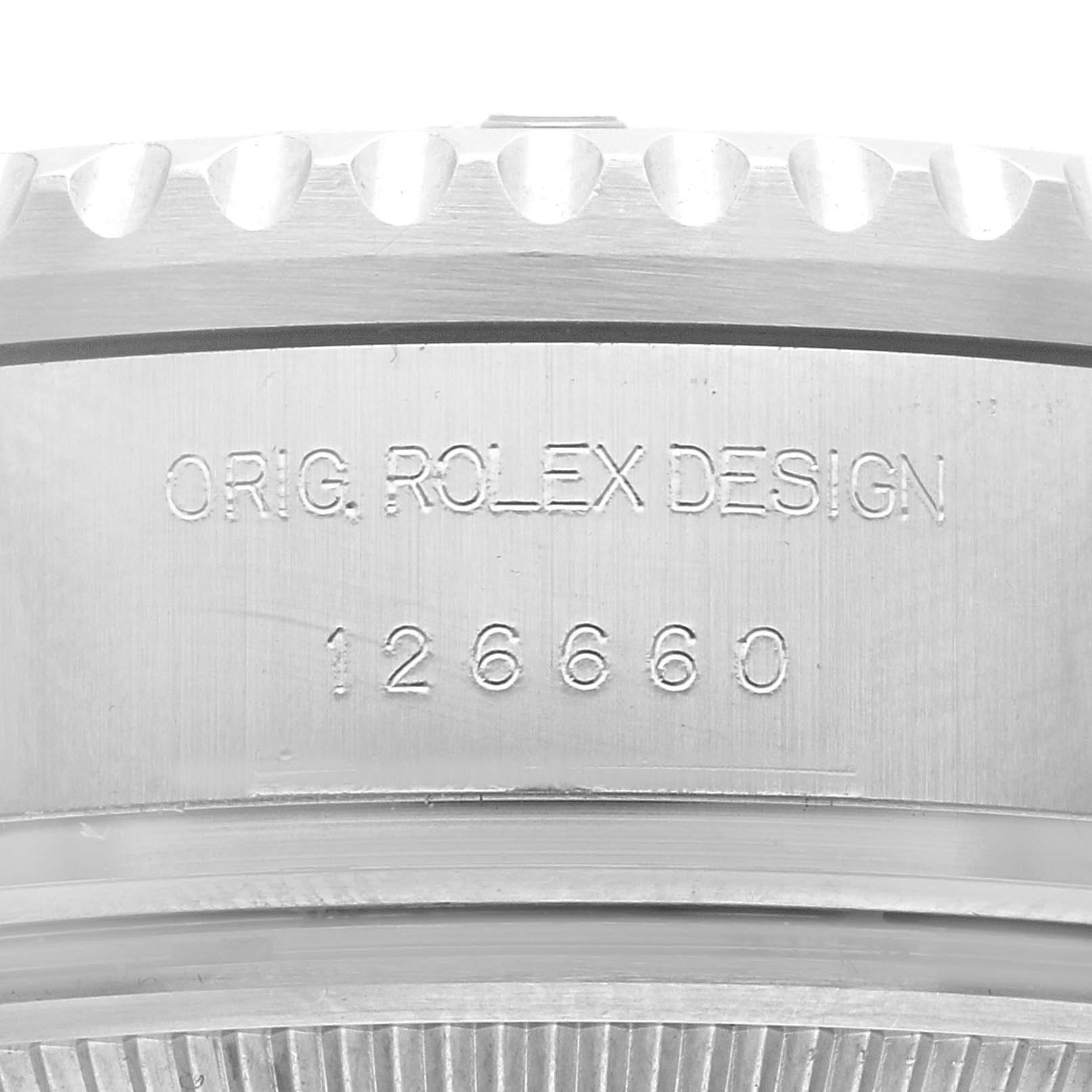 This image shows a close-up of the side casing of a Rolex Sea-Dweller 126660 Men's Stainless Steel Blue Dial 126660 Men's Stainless Steel Blue Dial, highlighting the model number 126660 and "ORIG. ROLEX DESIGN" engraving.