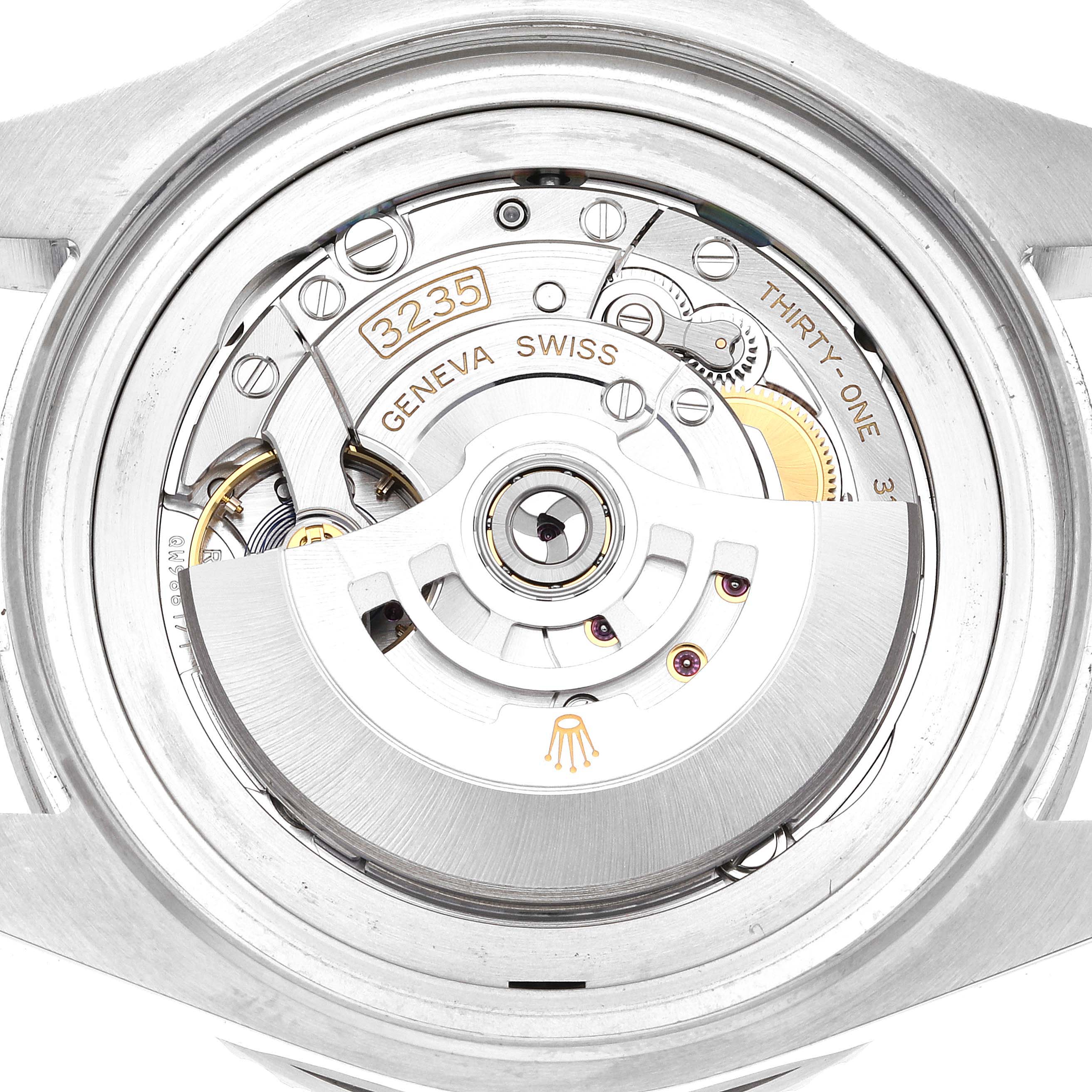 This image shows the back view of the Rolex Sea-Dweller 126660 Men's Stainless Steel Blue Dial 126660 Men's Stainless Steel Blue Dial watch, focusing on its exposed automatic movement and intricate inner details.