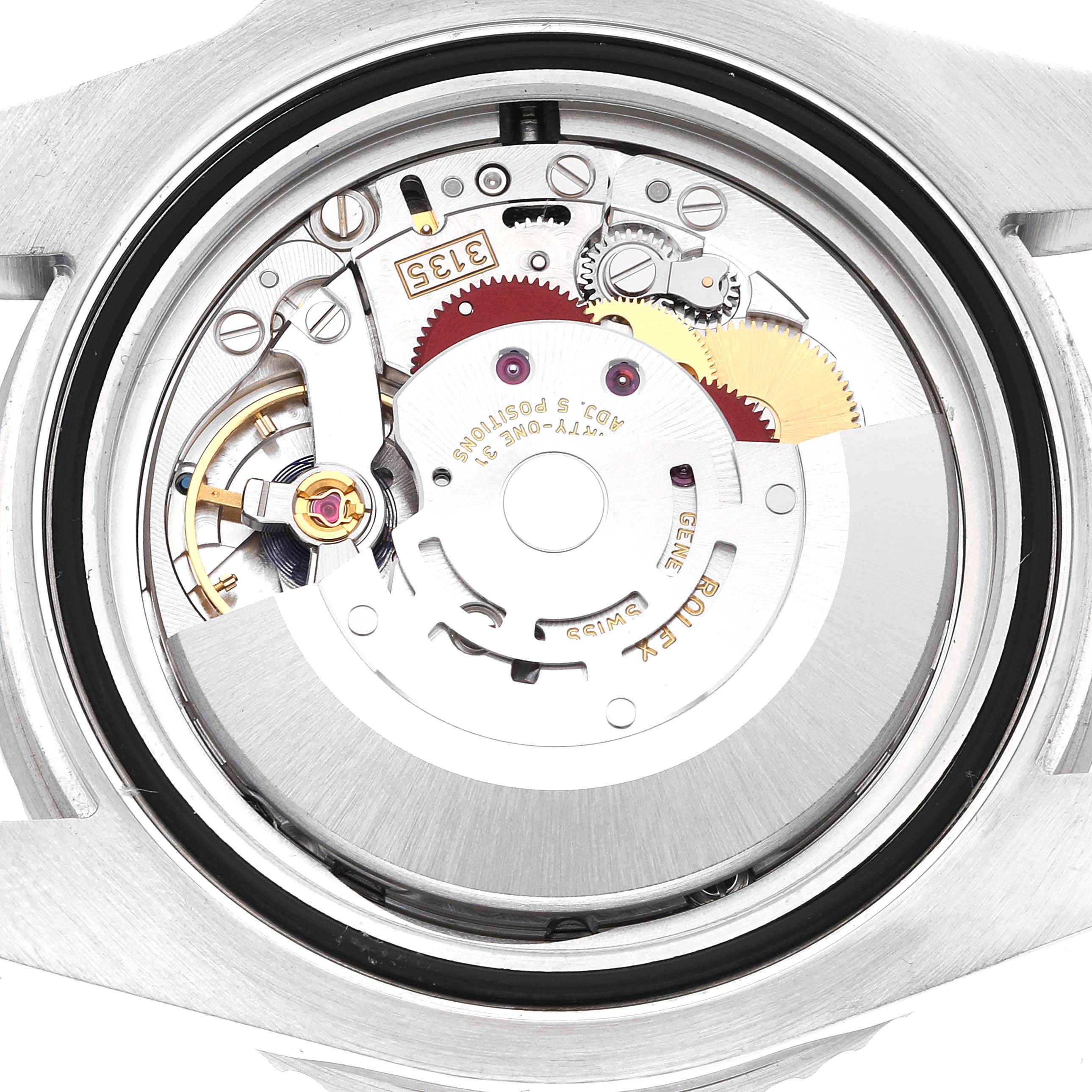 This image shows the movement and internal mechanism of a Rolex Submariner 116610LV Men's Stainless Steel Green Dial 116610LV Men's Stainless Steel Green Dial watch from a rear perspective.