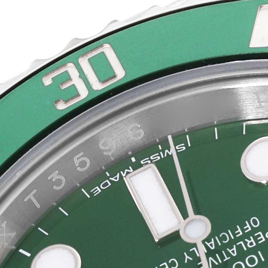 This close-up angle shows the upper-left section of the green dial and bezel of the Rolex Submariner 116610LV Men's Stainless Steel Green Dial 116610LV Men's Stainless Steel Green Dial watch, featuring the "30" mark.