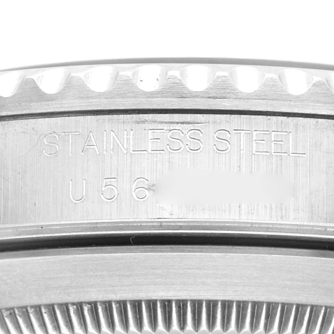 The image shows a close-up of the case back and outer edge of a Rolex Submariner 14060 Men's Stainless Steel Black Dial 14060 Men's Stainless Steel Black Dial, highlighting the stainless steel engraving.