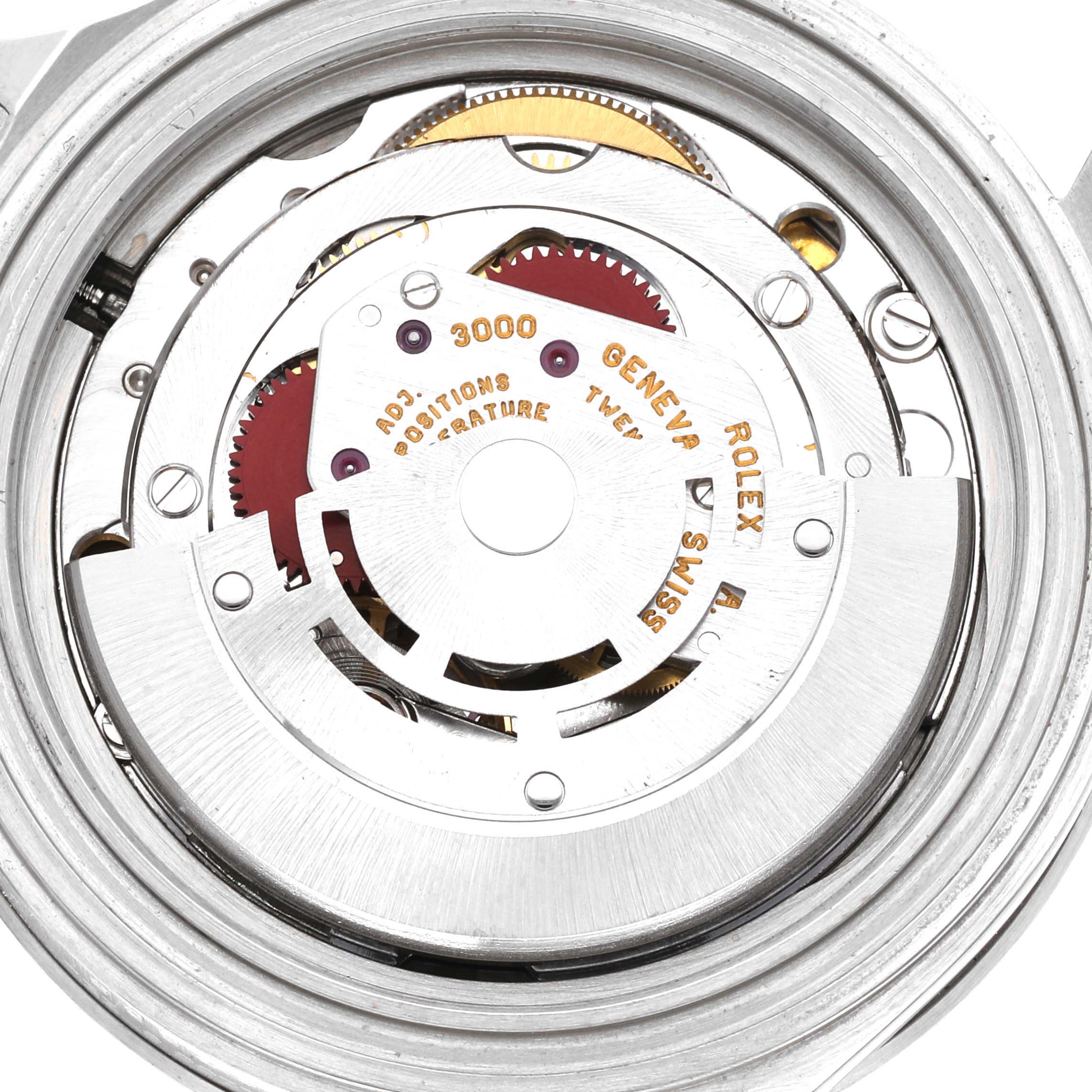 The image shows the movement from the back of a Rolex Submariner 14060 Men's Stainless Steel Black Dial 14060 Men's Stainless Steel Black Dial, highlighting its mechanical components.