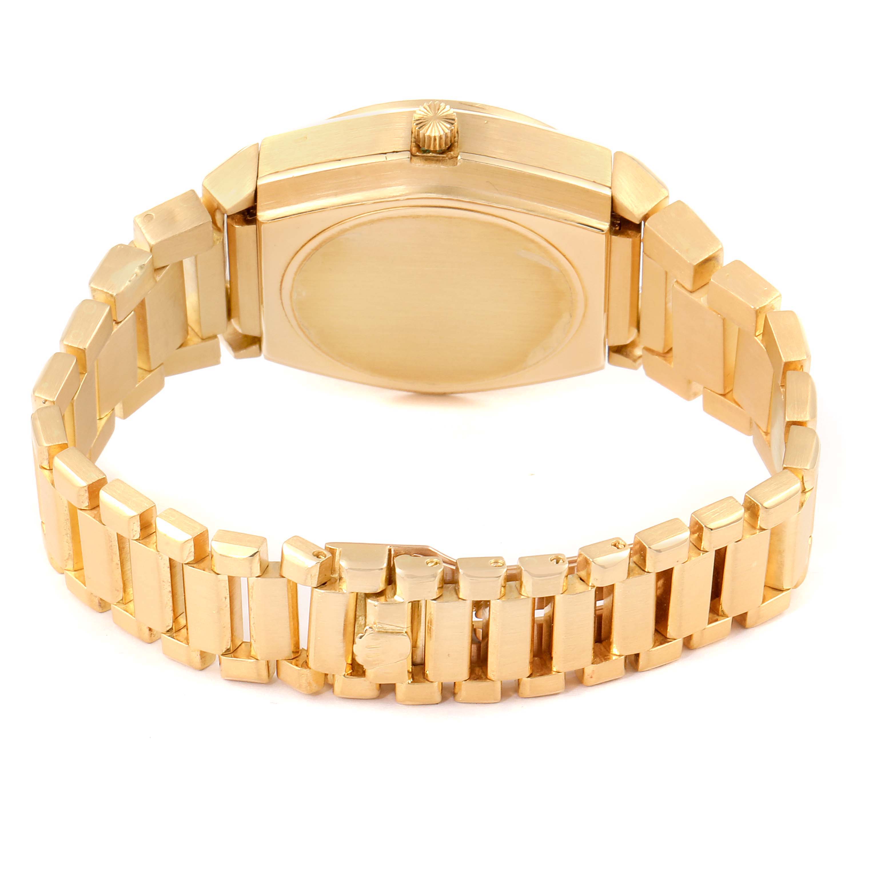 This image shows the back view of the Rolex Vintage Collection 5100 Men's Yellow Gold Silver Dial 5100 Men's Yellow Gold Silver Dial watch, displaying its gold bracelet and caseback.