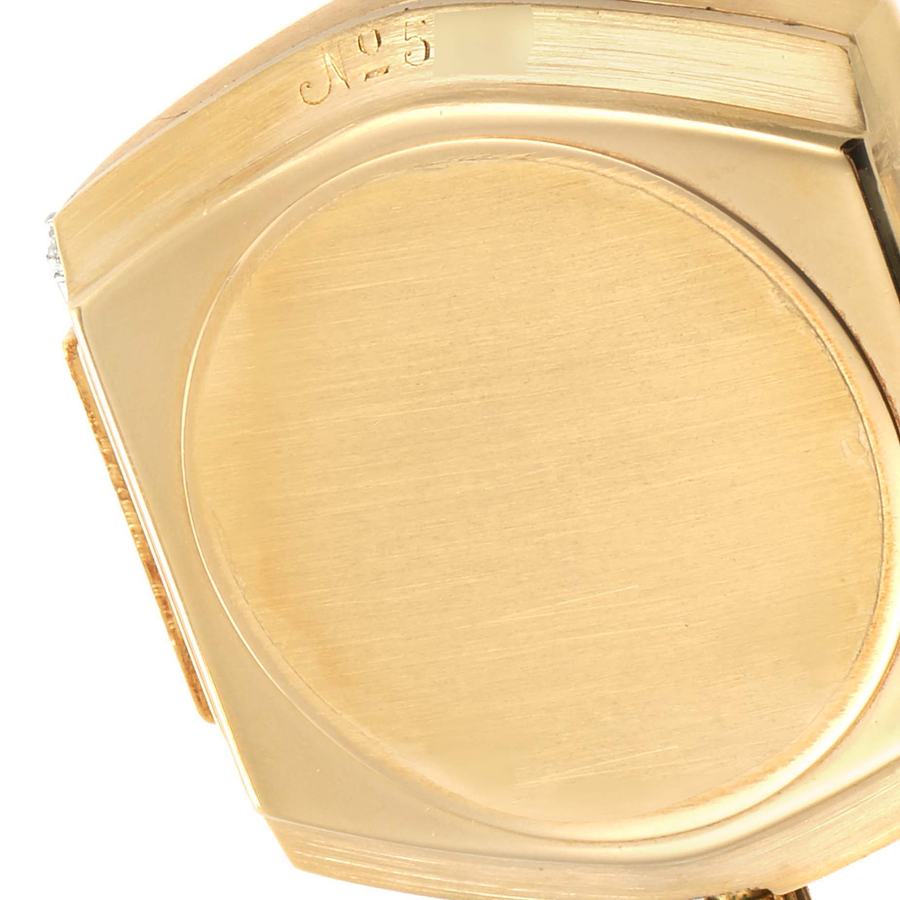 This image shows the back case of a Vintage Collection Rolex watch.