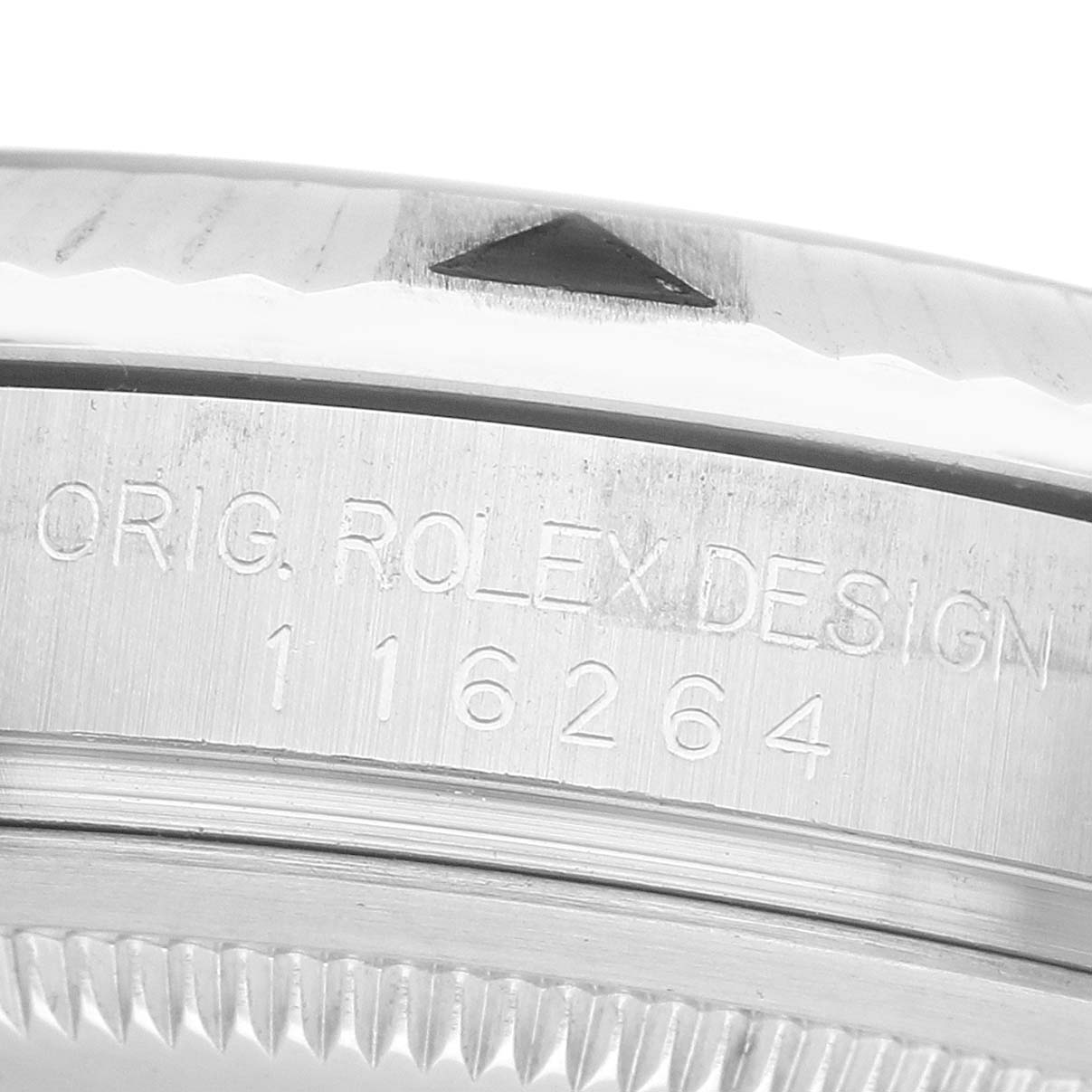 The image shows a close-up side view of the Rolex Turn-o-Graph 116264 Men's Stainless Steel Black Dial watch bezel and case with engraved model information.