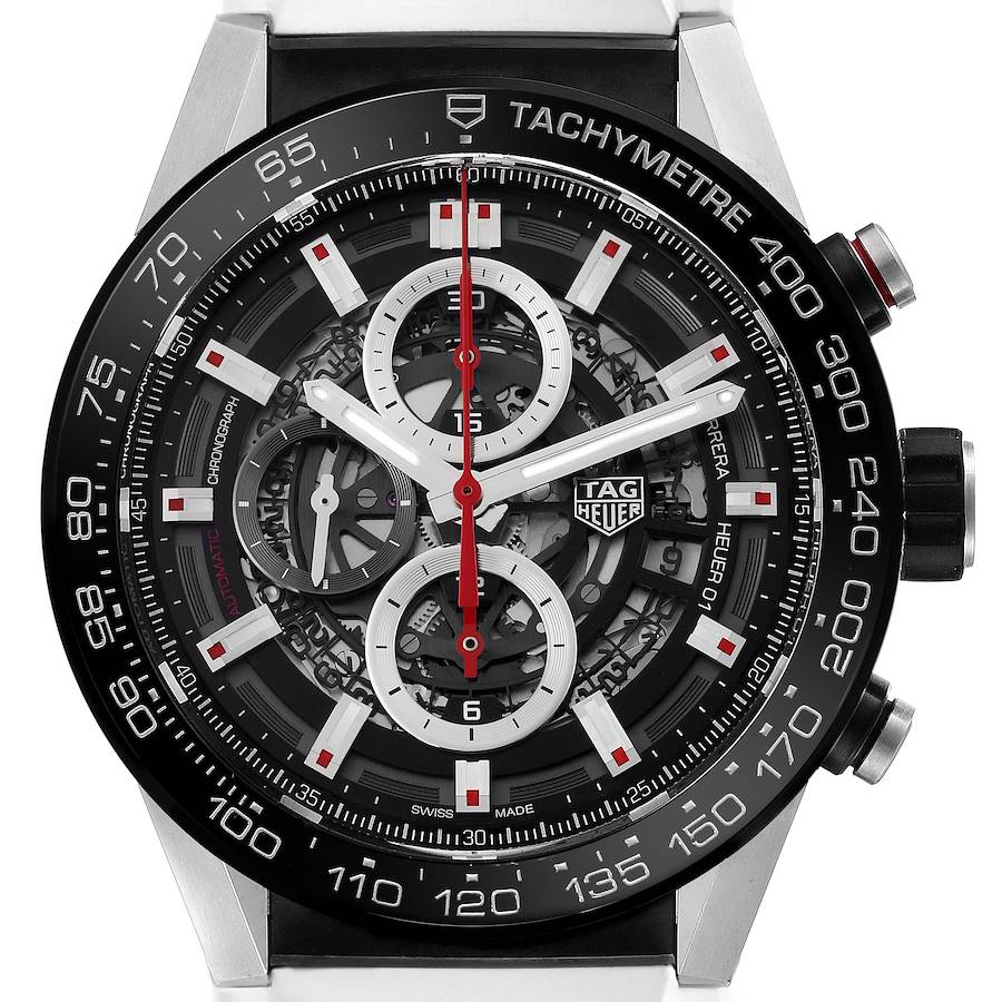 The Tag Heuer Carrera watch is shown from a front angle, highlighting the dial, tachymeter bezel, and chronograph features.