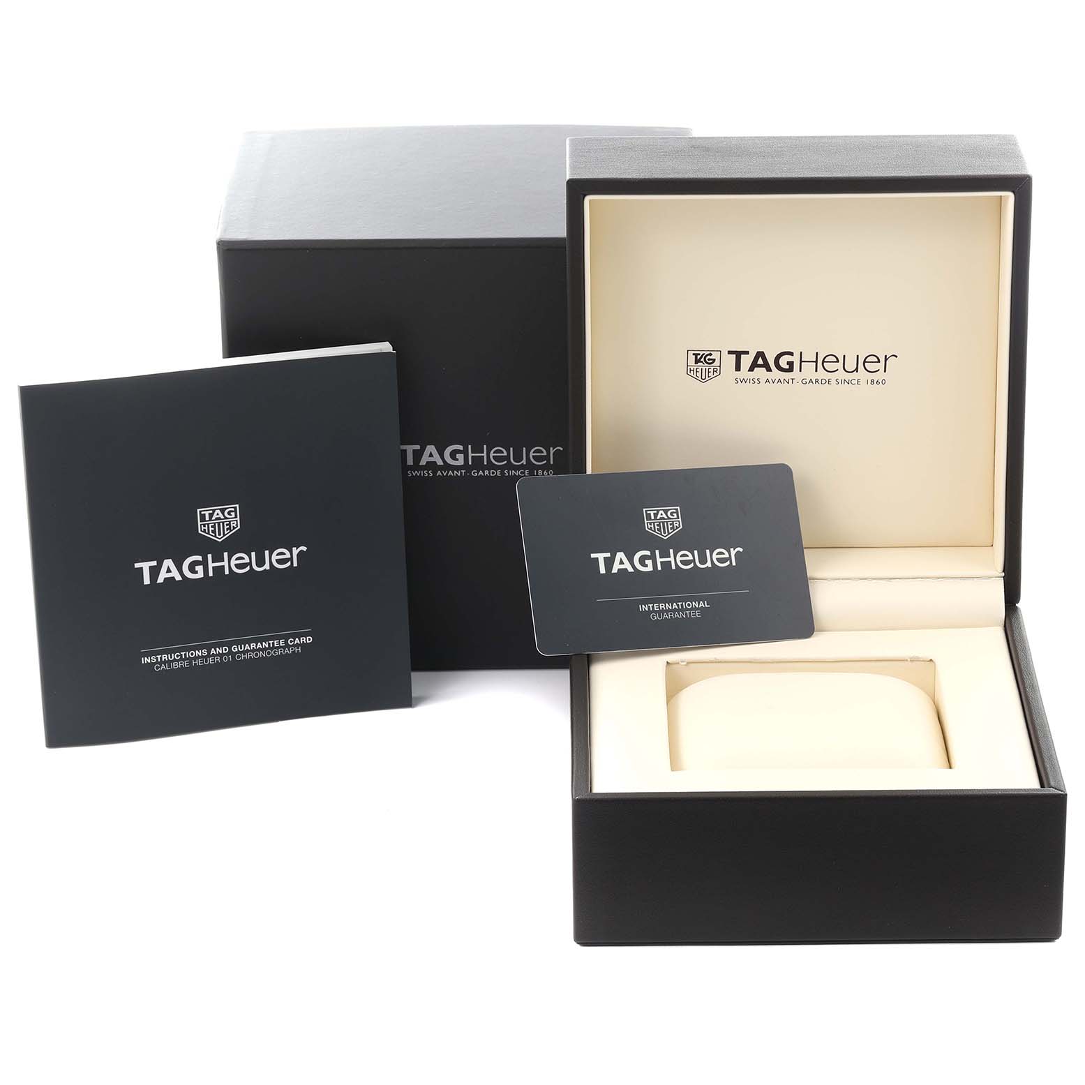 The image shows an open Tag Heuer Carrera CAR2A1Z.FT6051 Men's Stainless Steel Transparent Dial CAR2A1Z.FT6051 Men's Stainless Steel Transparent Dial box with instruction manual and international guarantee card.