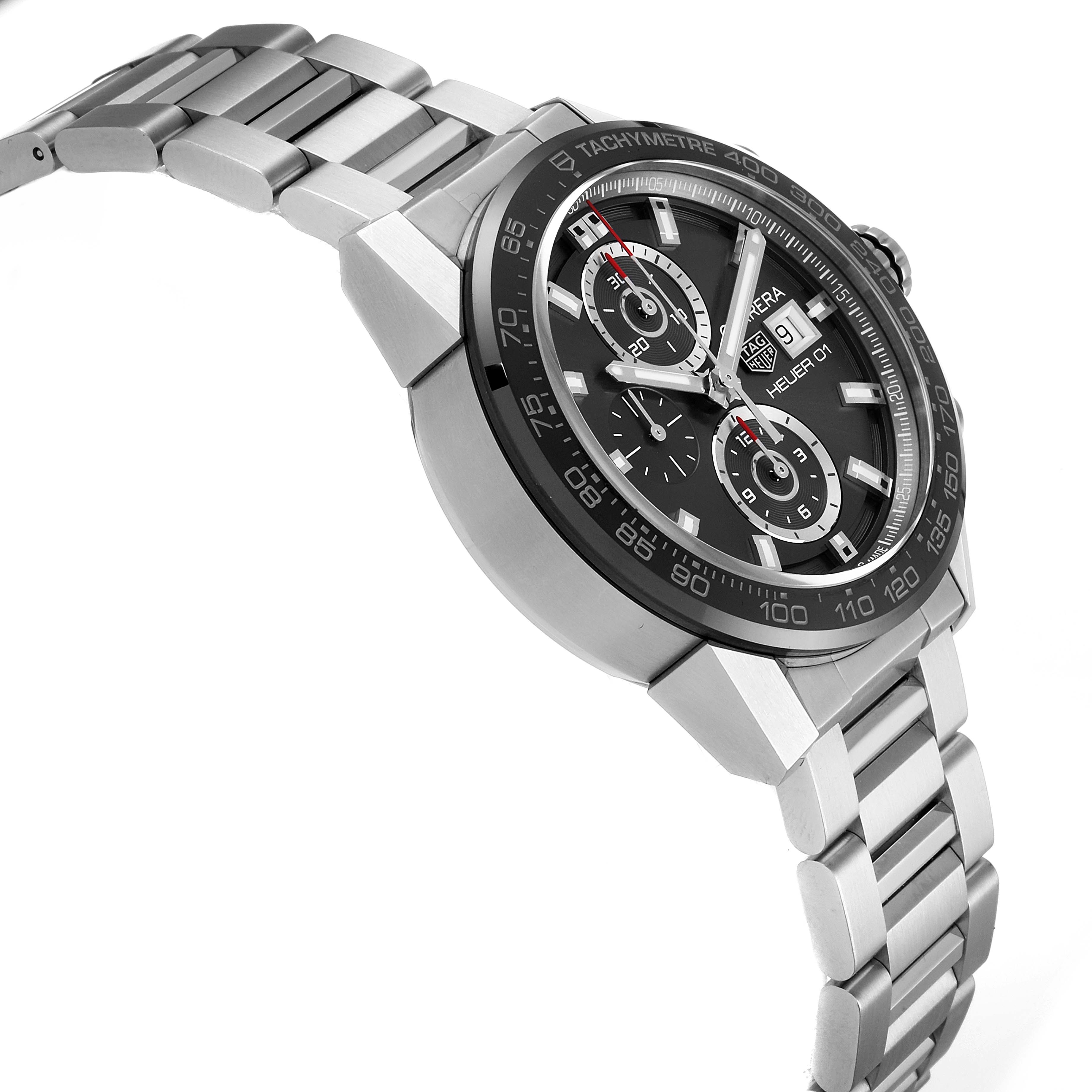 The image shows a side angle of the Tag Heuer Carrera CAR201W.BA0714 Men
s Stainless Steel Black Dial CAR201W.BA0714 Men
s Stainless Steel Black Dial watch, highlighting its bracelet, tachymeter bezel, and chronograph dial.