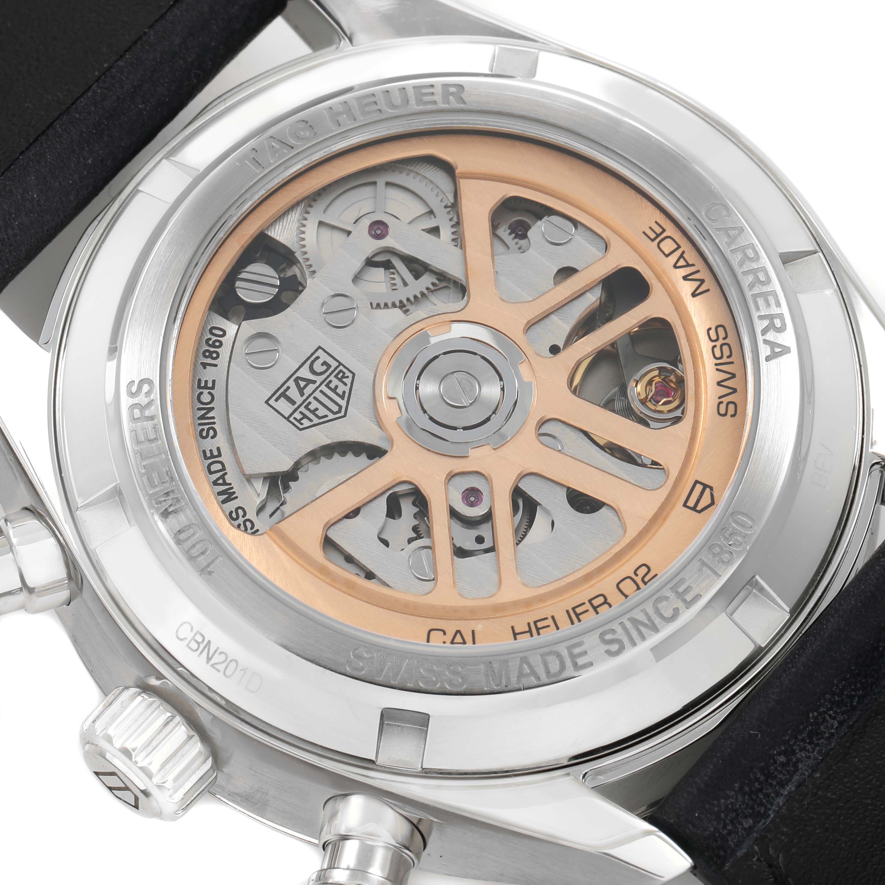 The image shows the back of the Tag Heuer Carrera CBN201D.FC6543 Men's Stainless Steel Blue Dial, displaying its exposed movement and engraving details.