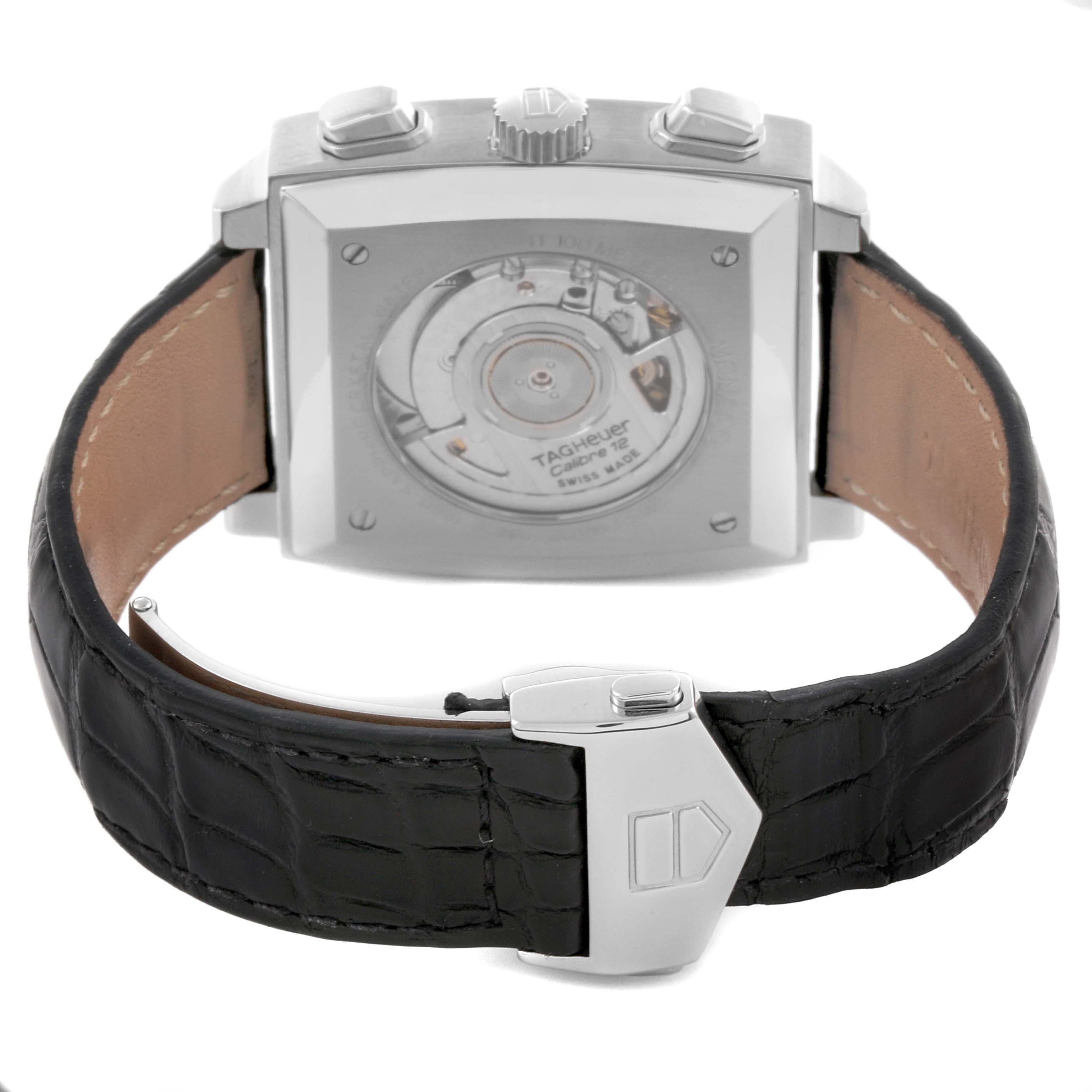 The image shows the back of a Tag Heuer Monaco CAW2110.FC6177 Men's Stainless Steel Black Dial CAW2110.FC6177 Men's Stainless Steel Black Dial watch, displaying the movement and clasp.