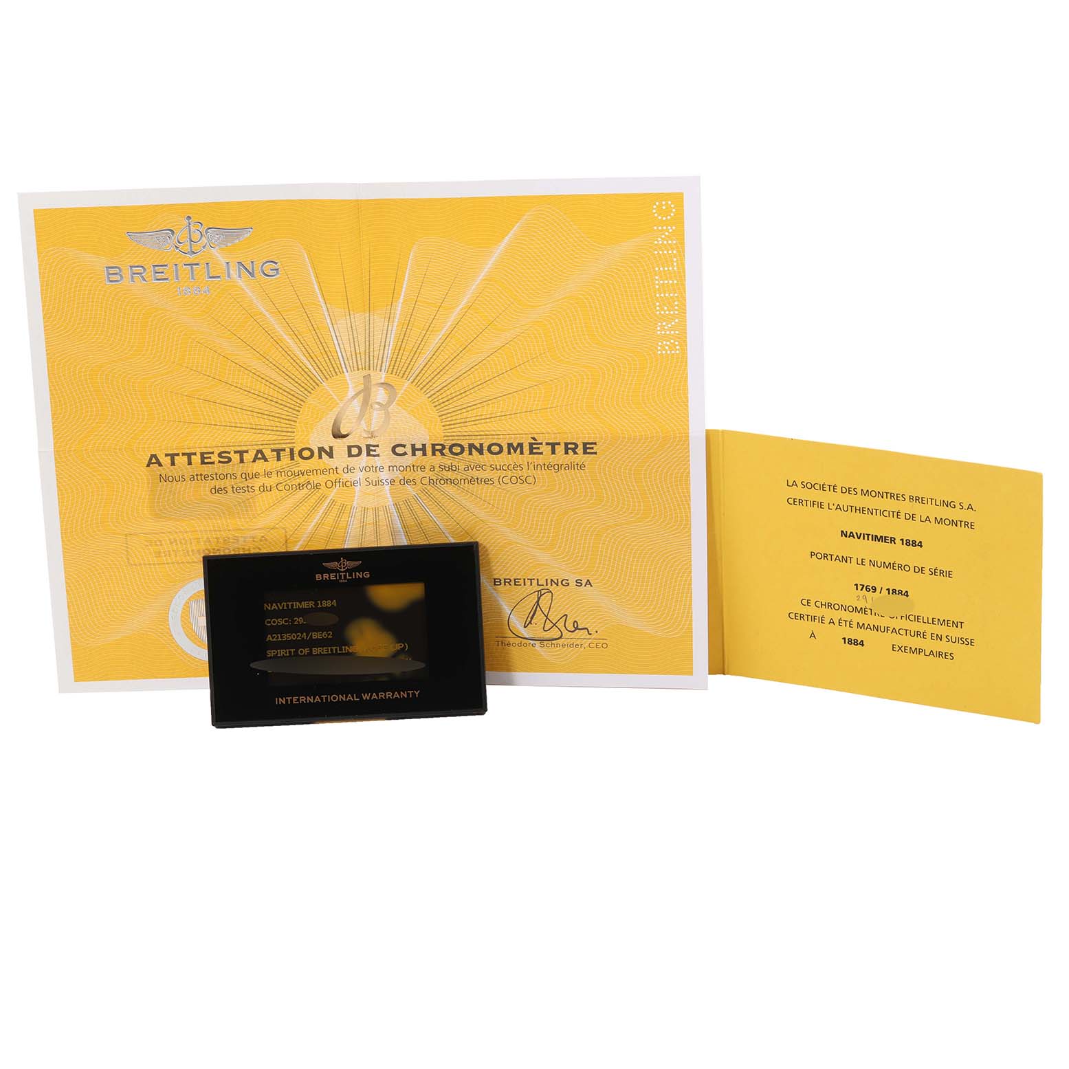 This image shows the warranty card, certificate of Best Quality
ity, and chronometer attestation for the Breitling Navitimer A2135024/BE62 Men
s Stainless Steel Black Dial A2135024/BE62 Men
s Stainless Steel Black Dial 1884 Limited Series model.