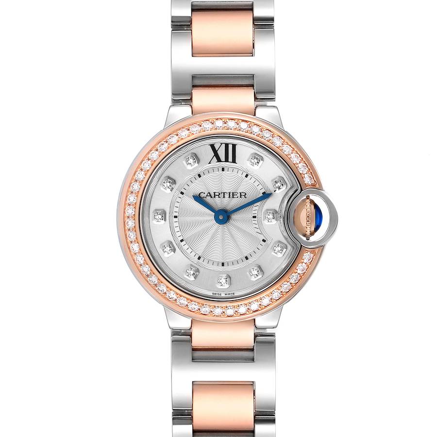 The Cartier Ballon Bleu watch is shown from a top-down angle, displaying the face, bezel, and part of the bracelet.