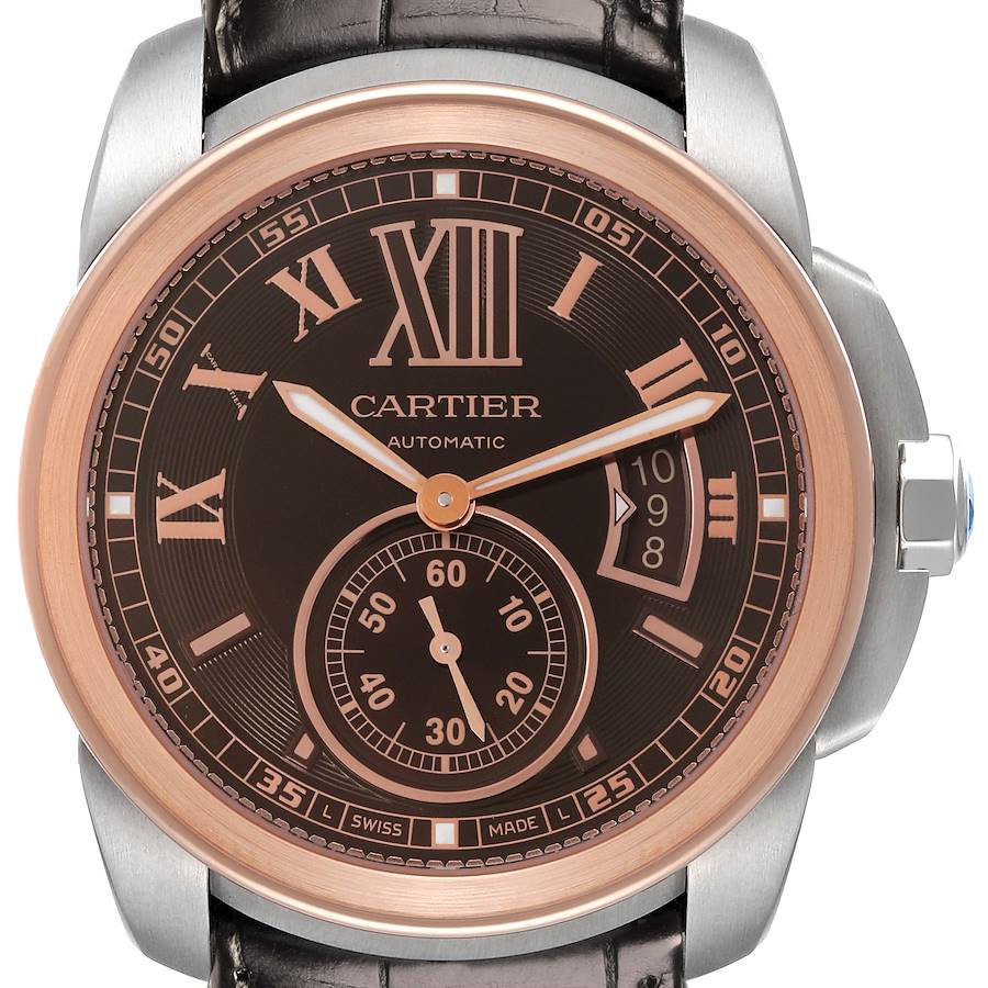 The Calibre de Cartier watch is shown from a front angle, displaying the dial, hands, and crown.