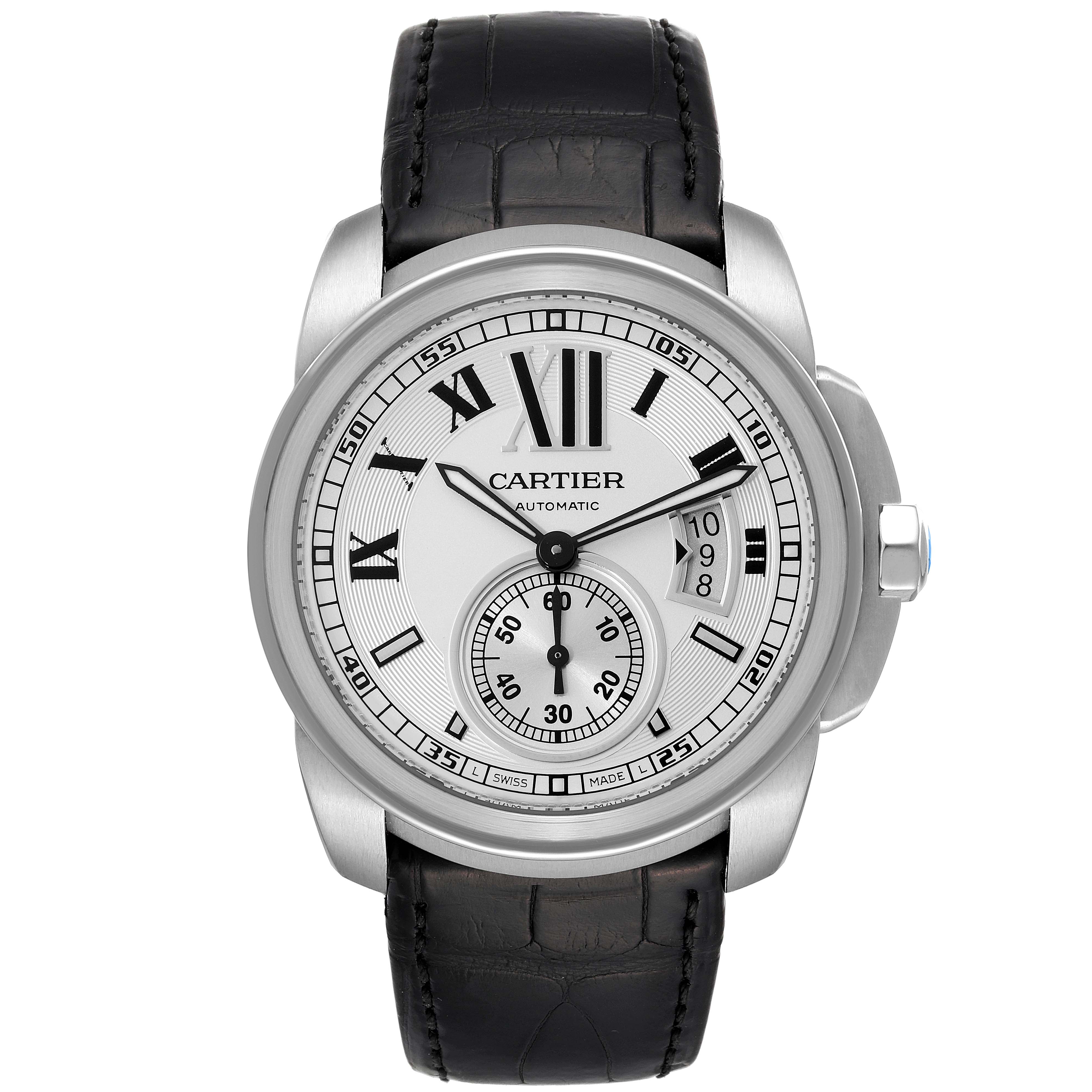 The Calibre de Cartier watch by Cartier is shown from the front, displaying its dial, hands, date window, and leather strap.