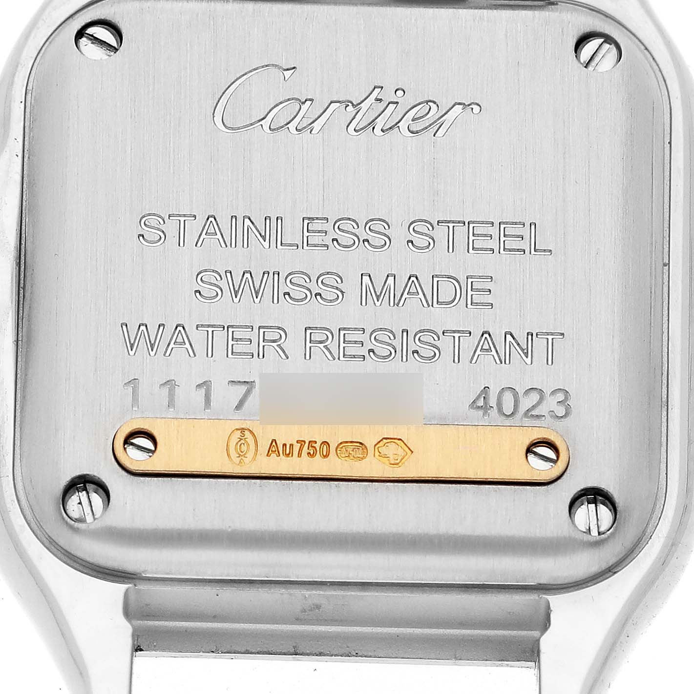The image shows the back case of a Panthere model by Cartier, highlighting the stainless steel back and inscriptions.