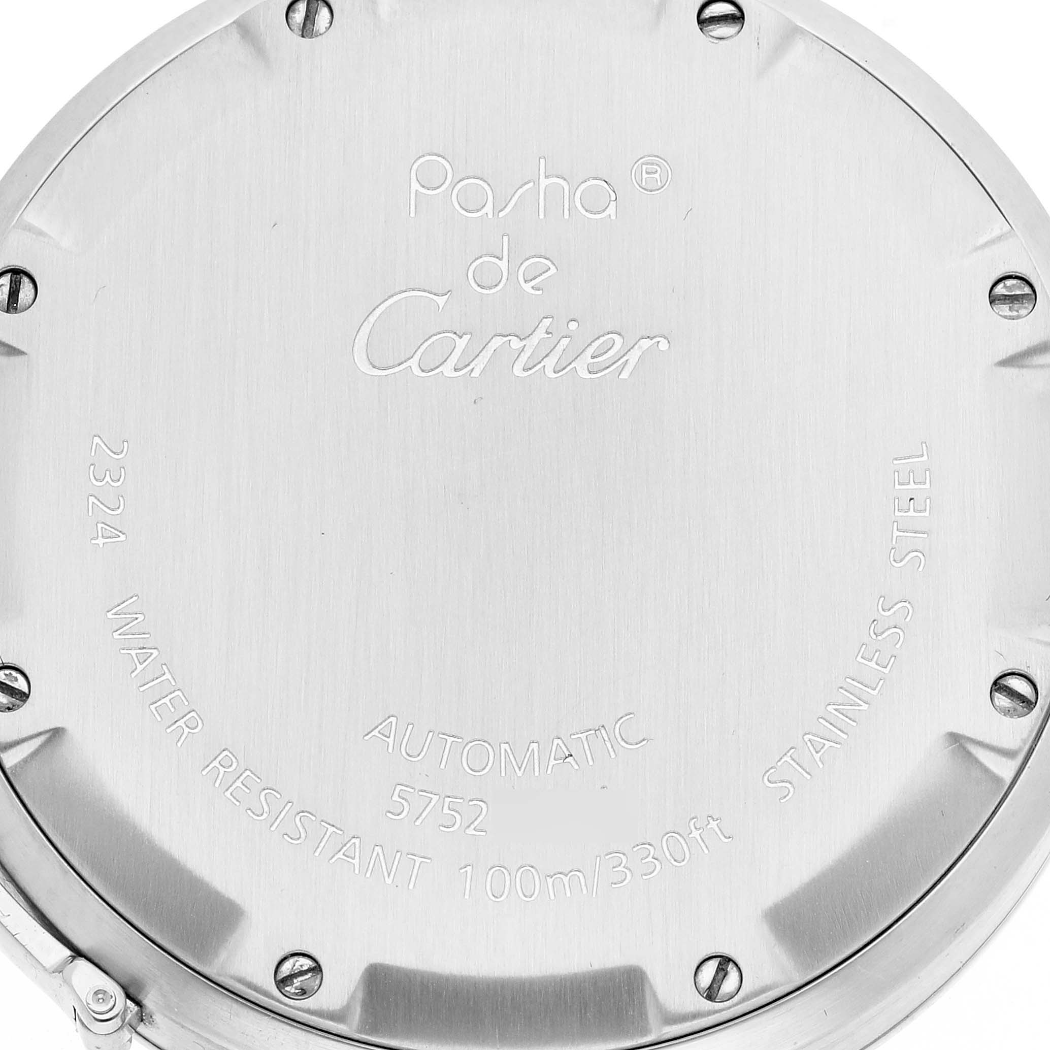 The image shows the back case of a Pasha de Cartier watch, highlighting its engravings and specifications.