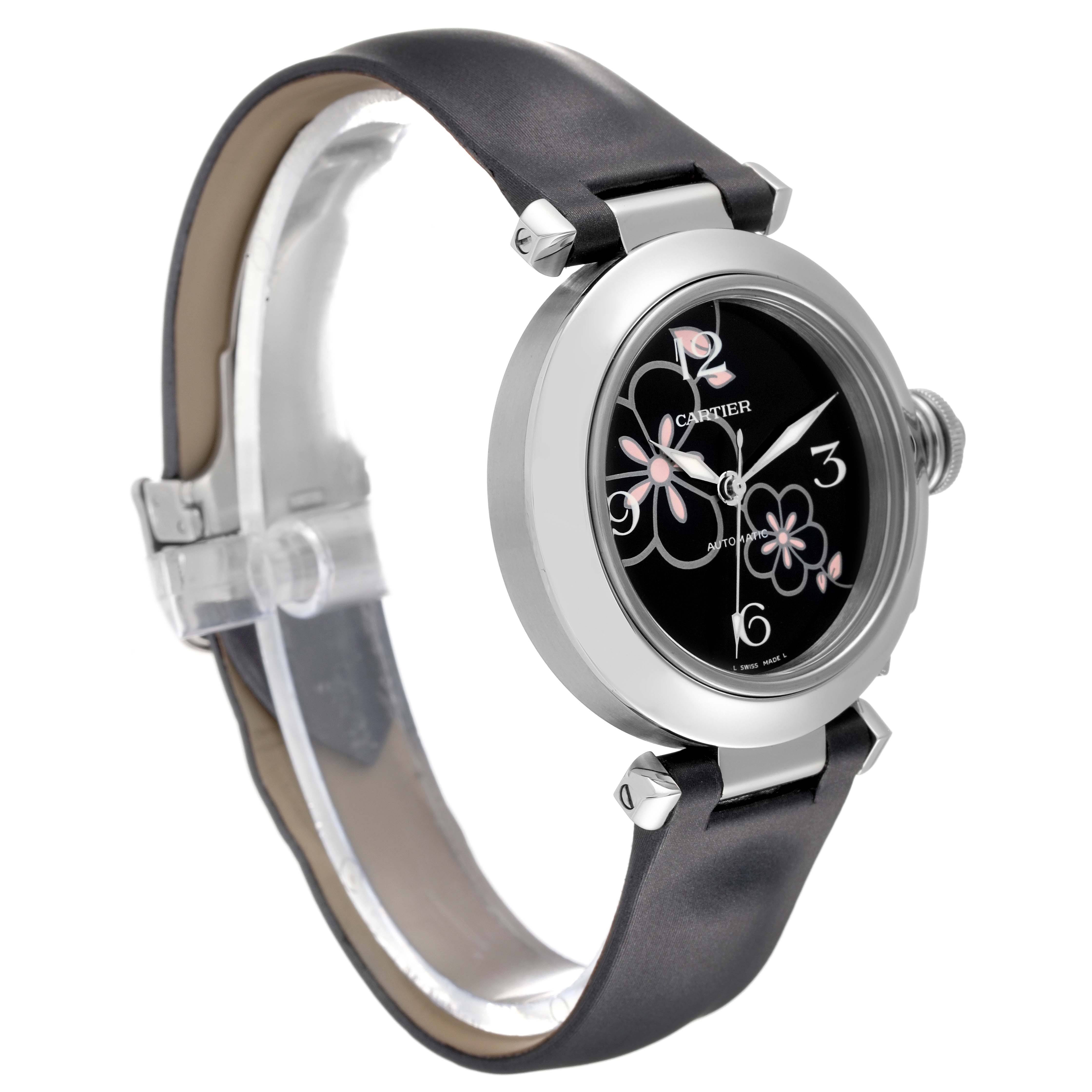 The image shows a side and front angle of a Cartier Pasha W3109699 Women's Stainless Steel Black Dial W3109699 Women's Stainless Steel Black Dial watch with a floral-patterned black dial and a black leather strap.