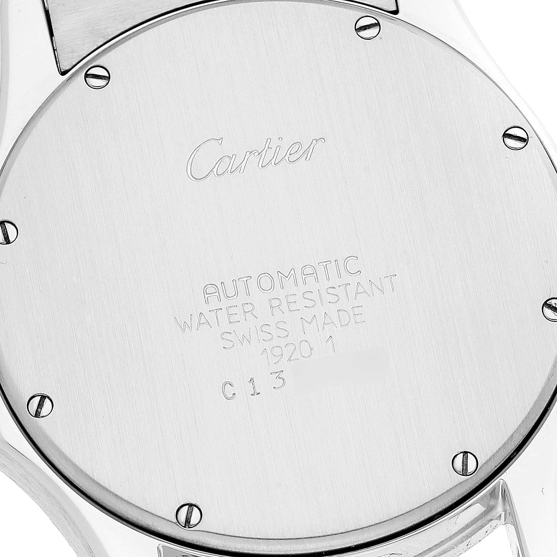 This image shows the back of a Santos model watch by Cartier, highlighting the engraving and case screws.