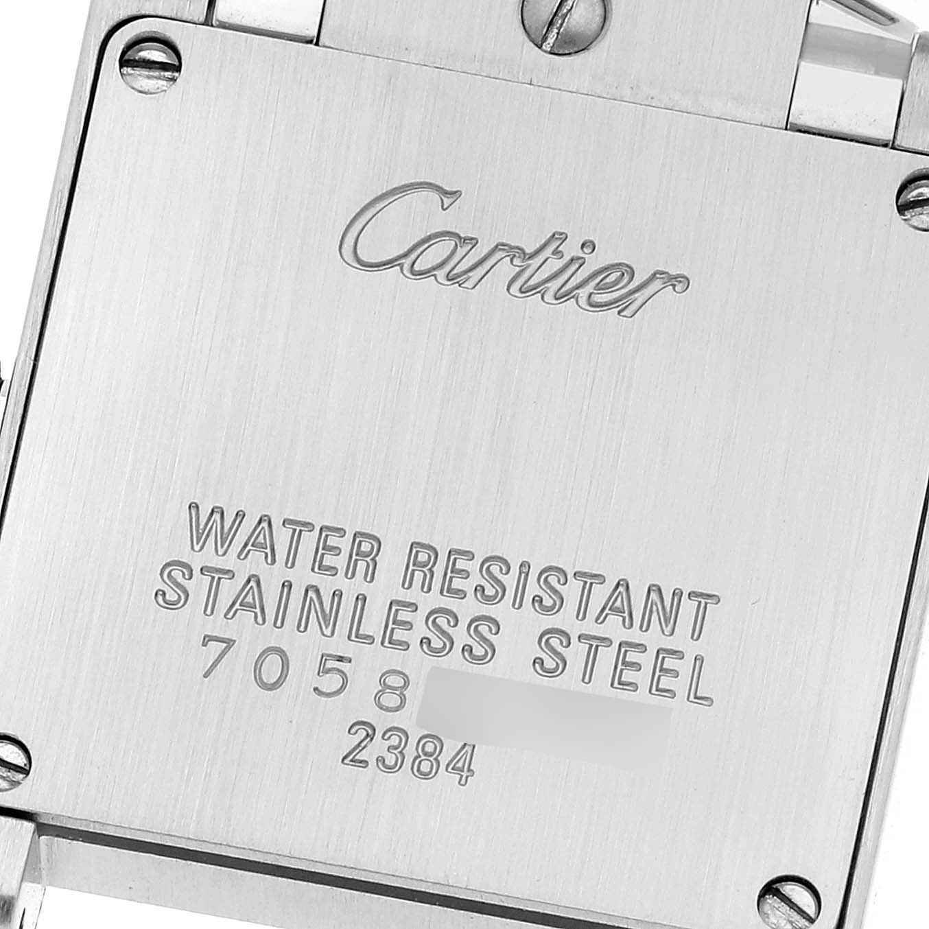 The image shows the back case of the Cartier Tank Francaise W51031Q3 Women's Stainless Steel Silver Dial W51031Q3 Women's Stainless Steel Silver Dial watch, highlighting branding and material details.