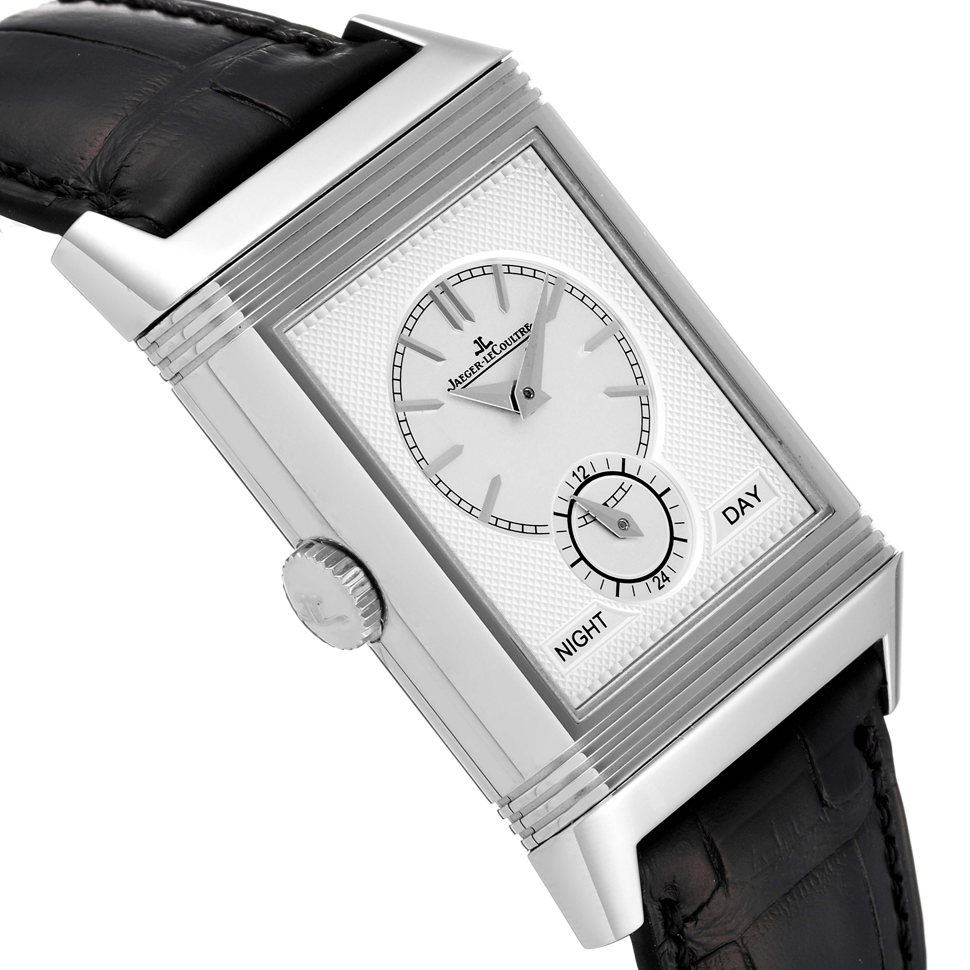 This image shows a close-up side angle of the Jaeger LeCoultre Reverso Q3988482 Men's Stainless Steel Blue Dial Q3988482 Men's Stainless Steel Blue Dial watch, highlighting its dial, crown, and leather strap.