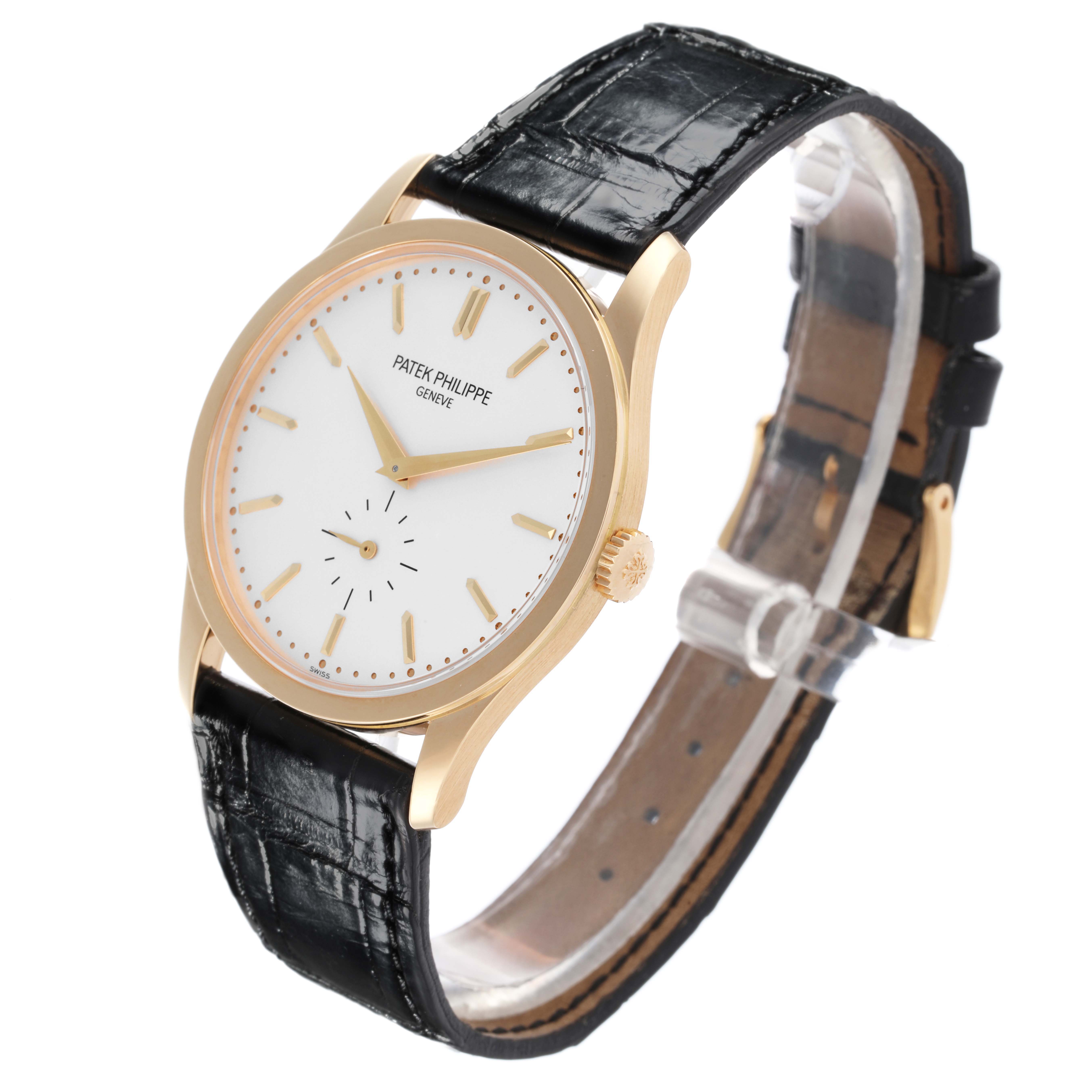 The Patek Philippe Calatrava 5196J Men's Yellow Gold Silver Dial 5196J Men's Yellow Gold Silver Dial watch is shown at a slight angle, highlighting the face, bezel, and leather strap.